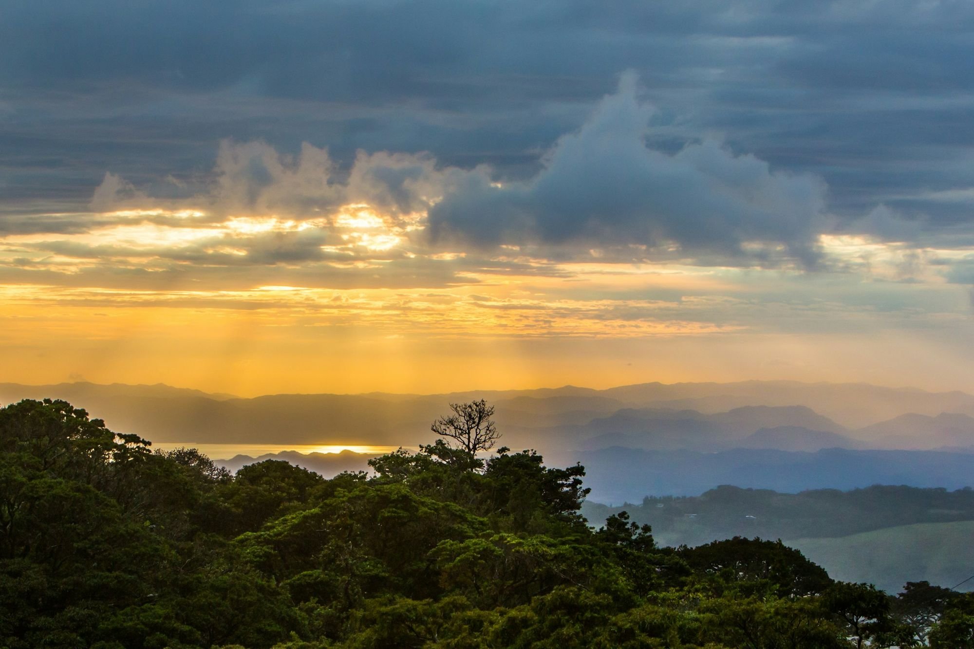 Golden light over Costa Rica’s forested mountains