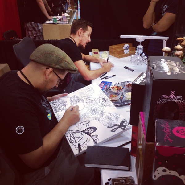 KMNDZ & NC Winters drawing at one of our DesignerCon booths