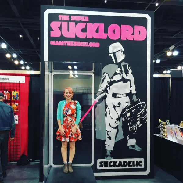 Miri posing in a Sucklord bootleg action figure blister