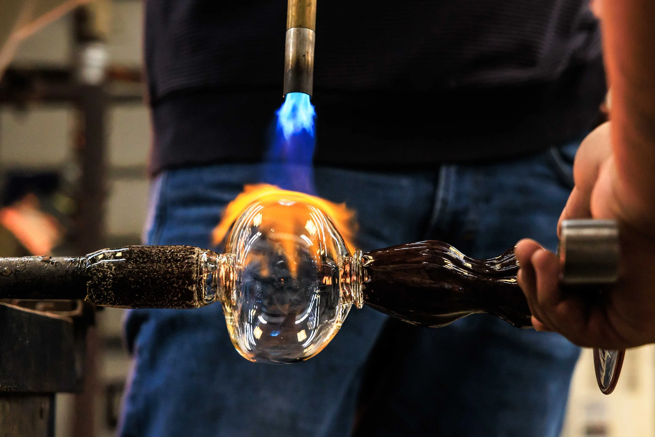  Joe Rife applies a torch while assisting Ernesto Navarro, Friday, May 29, 2026.  