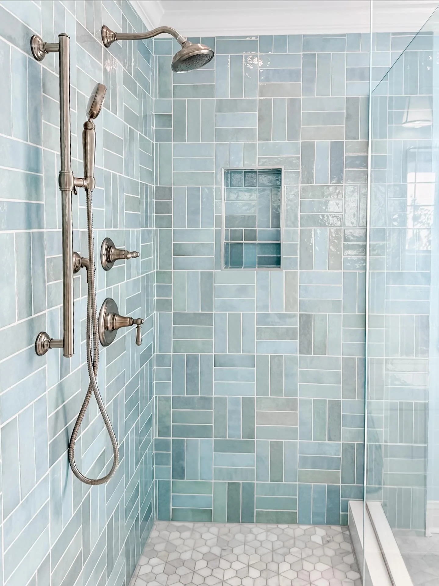 Wrapped up this stunning shower for a client! The bold blue tile with its unique stack pattern makes it a true statement piece&mdash;modern, fresh, and full of personality! 
.
.
.
.
.
#contracting #construction #renovation #remodel #generalcontractor
