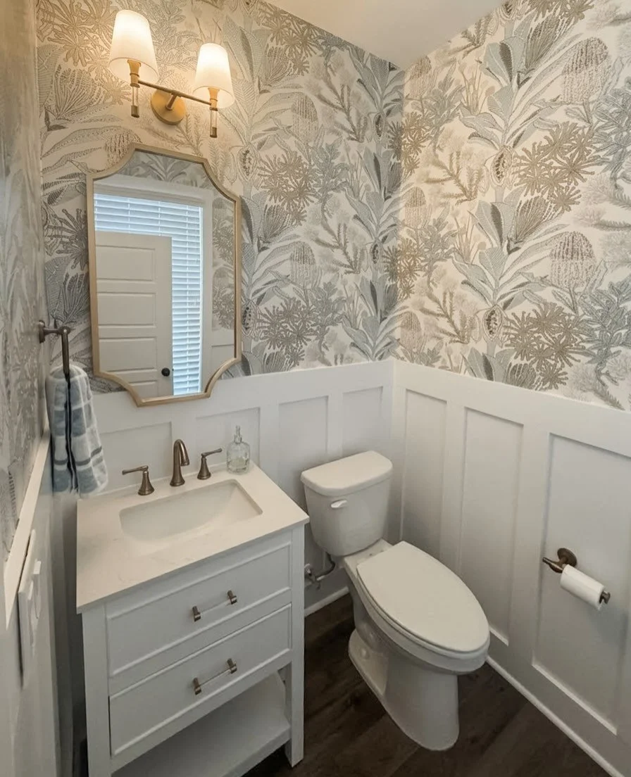 Small space, BIG transformation!

This powder bathroom went from basic to beautiful with a few thoughtful changes that made all the difference. We replaced the pedestal sink with a statement vanity, added new lighting and a gorgeous mirror, brought i