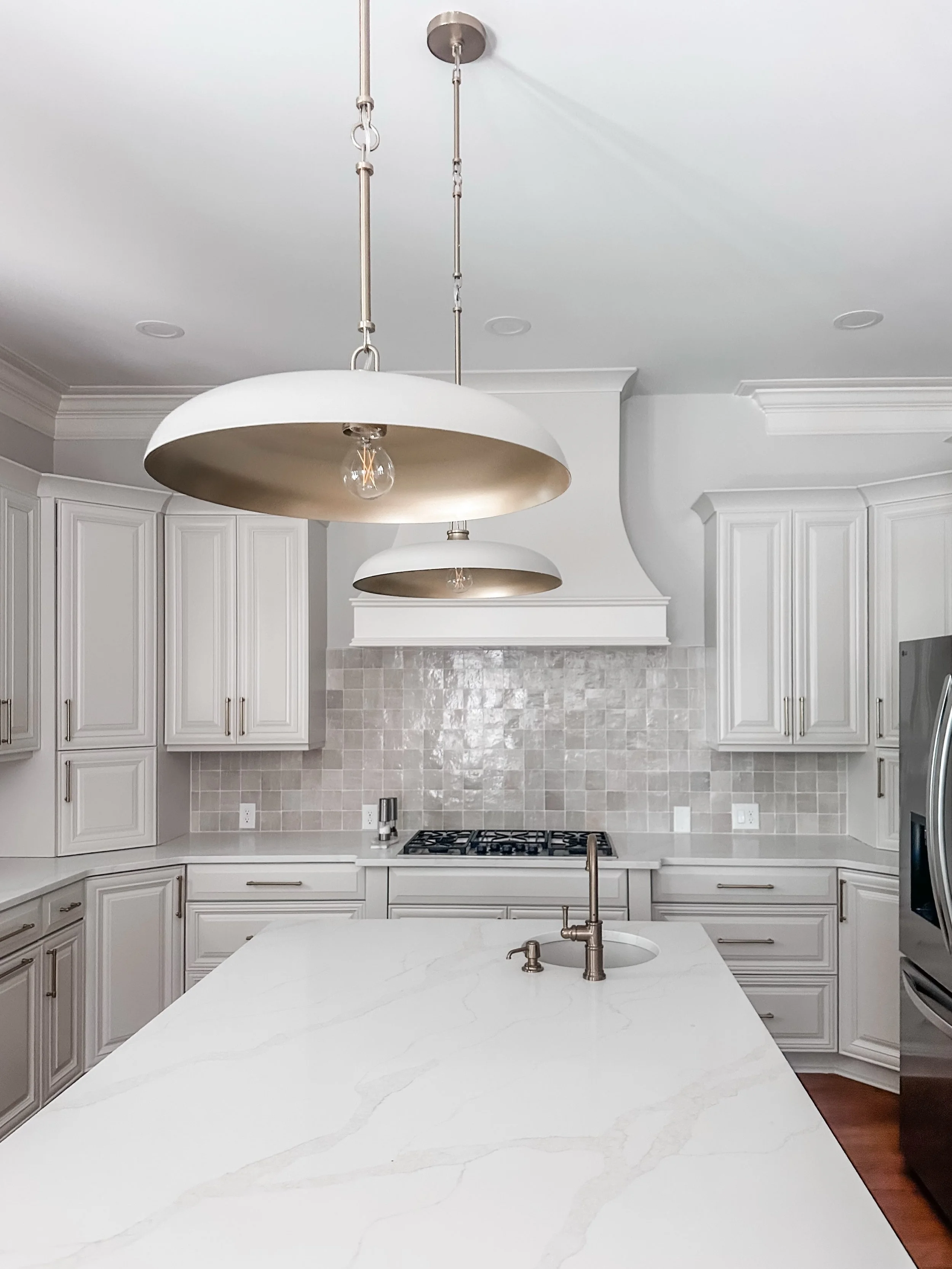 One of our favorite features in this kitchen is the gorgeous Zellige backsplash tile. Each tile is handcrafted, with subtle variations in color, shape, and glaze that create beautiful texture and depth. No two tiles are exactly alike, giving the back