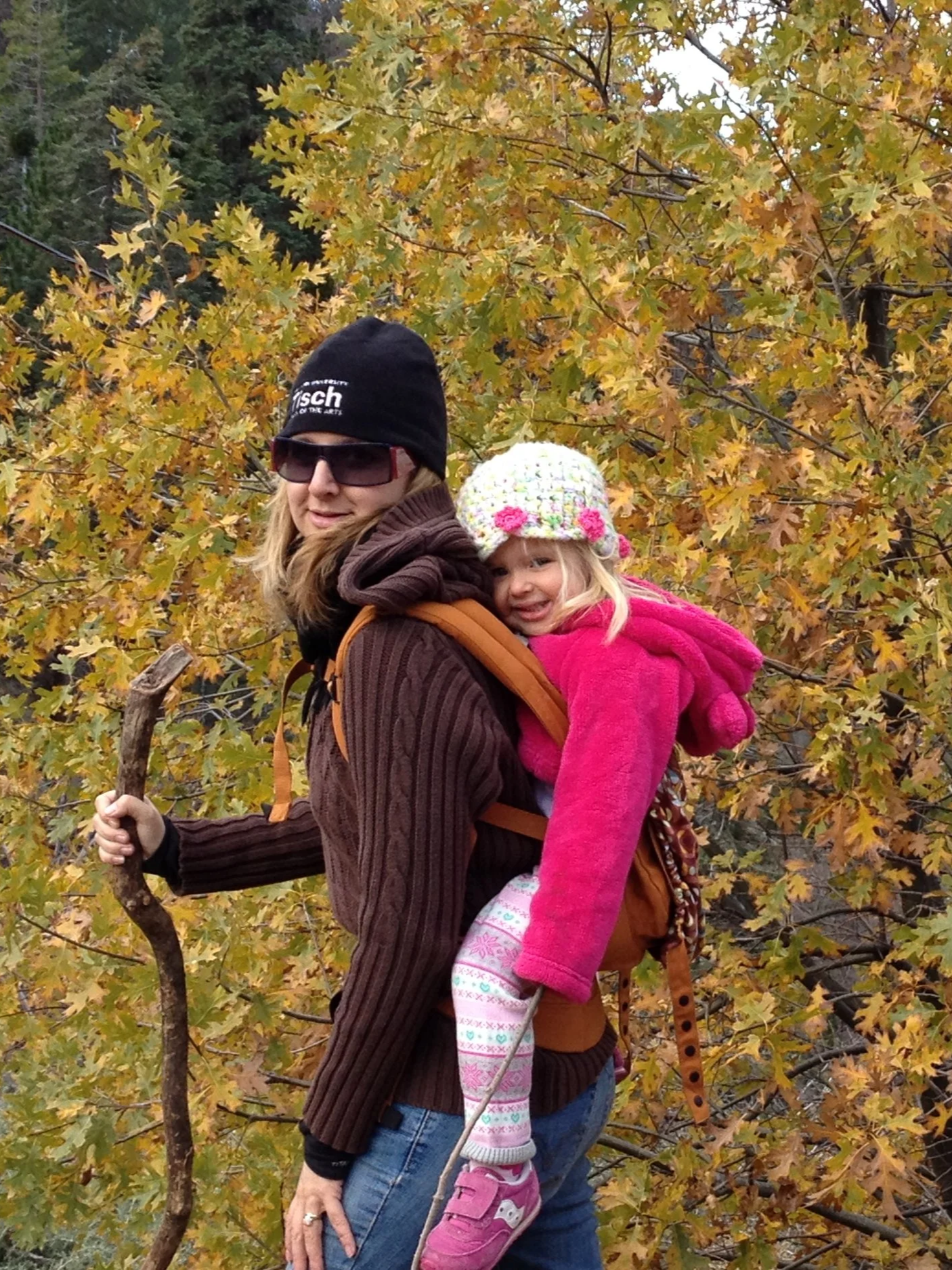 SJ Hodges walking in the woods with her daughter Ceci