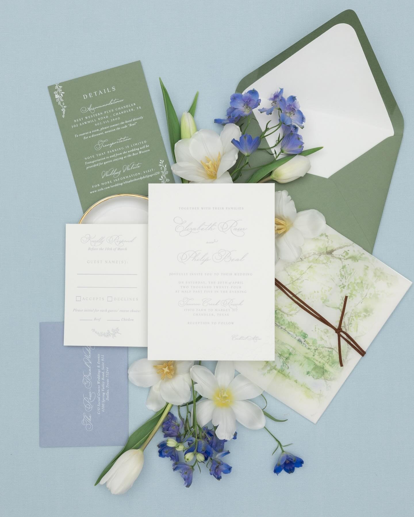 Elizabeth and Philip&rsquo;s invitation showcased delicate florals, letterpress printed in a soft blue. The suite was packaged with vellum wrap with watercolor illustration of their home and bound with leather tie.⁠
.⁠
Photography + Styling | @julian