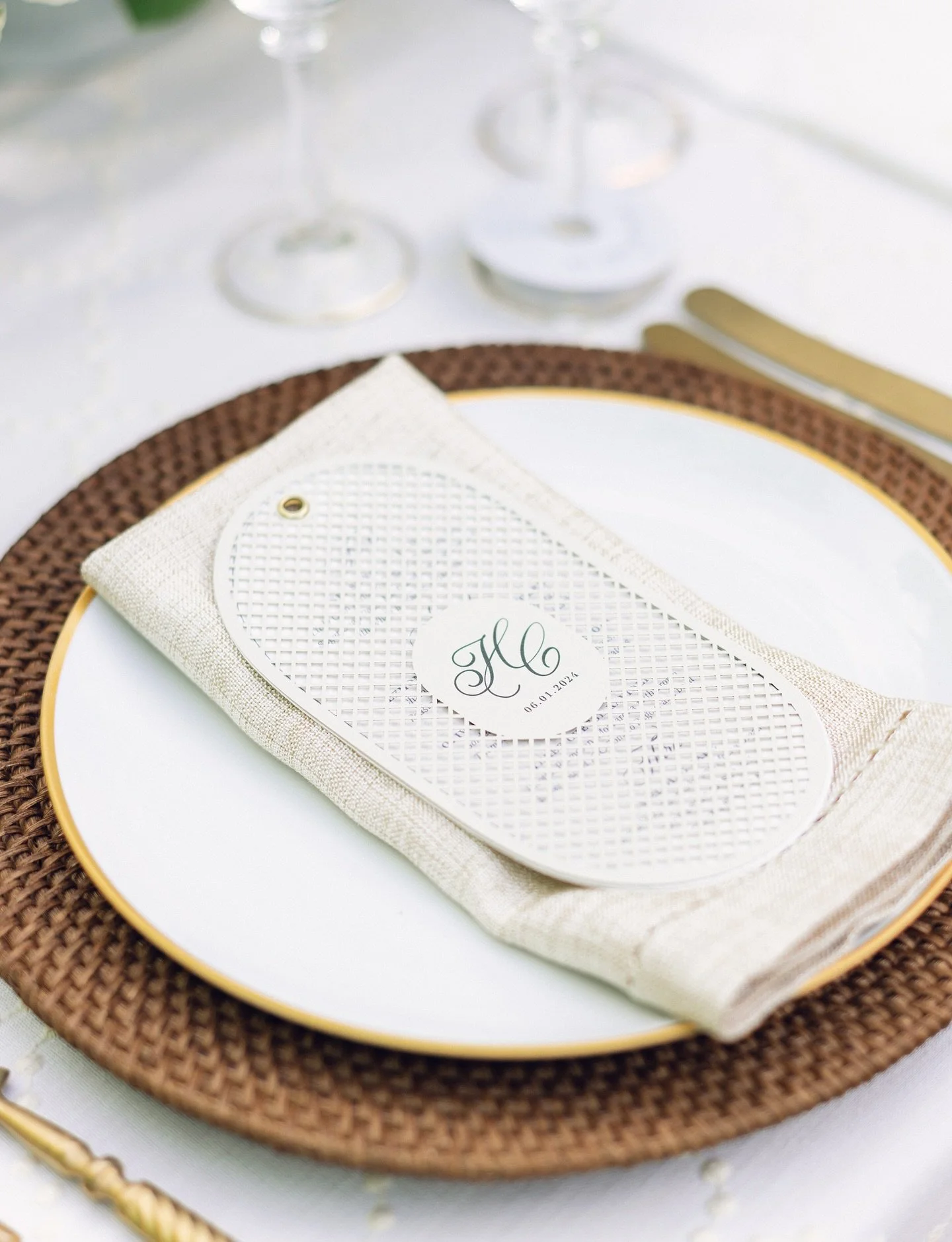 Under the Napa sky, Henslee &amp; Cole&rsquo;s reception unfolded like a dream. Laser-cut menus delicately layered over letterpress, wine glass place cards catching the evening light, and crisp table numbers tying it all together. Every detail in sha