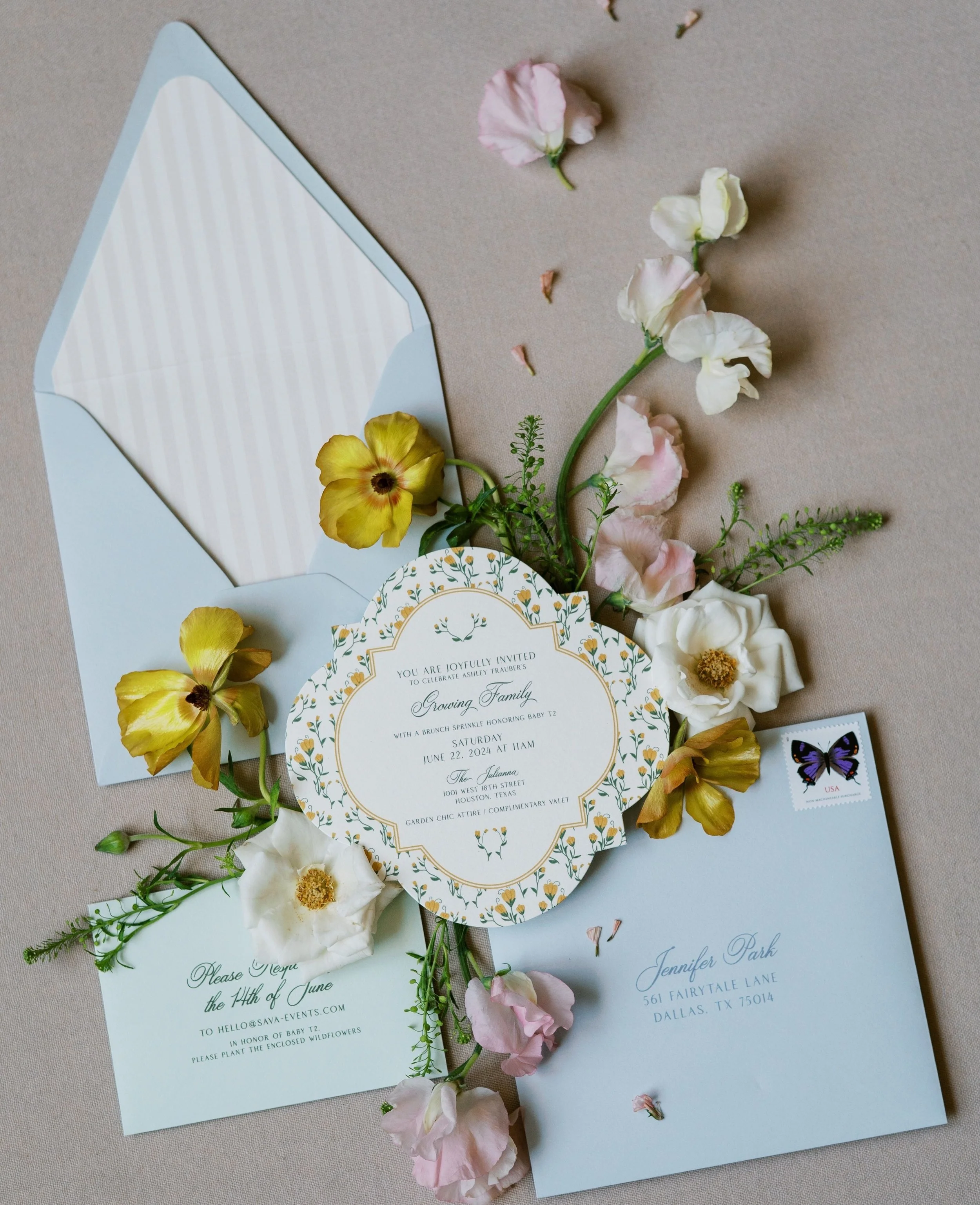 A baby shower invitation designed around a growing garden theme, celebrating new beginnings in the sweetest way. The die cut invitation was surrounded by cheerful yellow florals, setting a soft, sunny tone from the start. Guests received seed packets