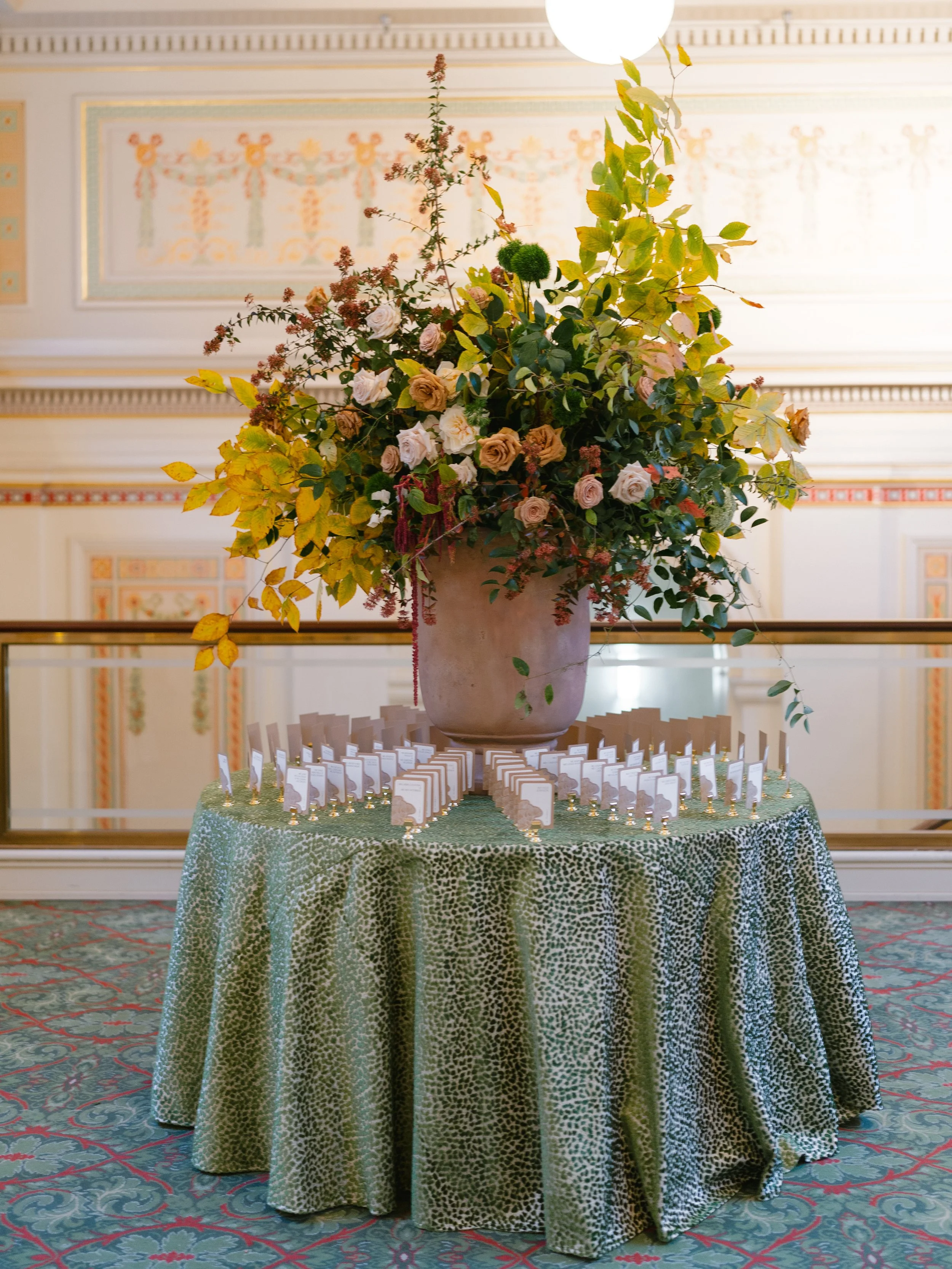 Die Cut Escort Card Pockets with Ginko Leaves at Union Station in Washington D.C. on Table with Floral Arrangement