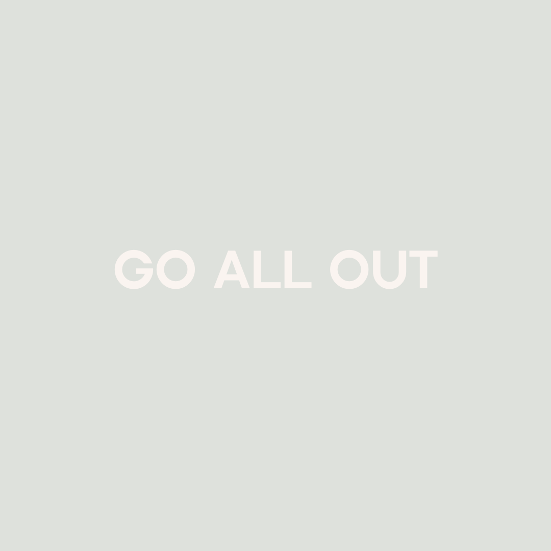 Light gray background with the text 'GO ALL OUT' in white font centered in the image.