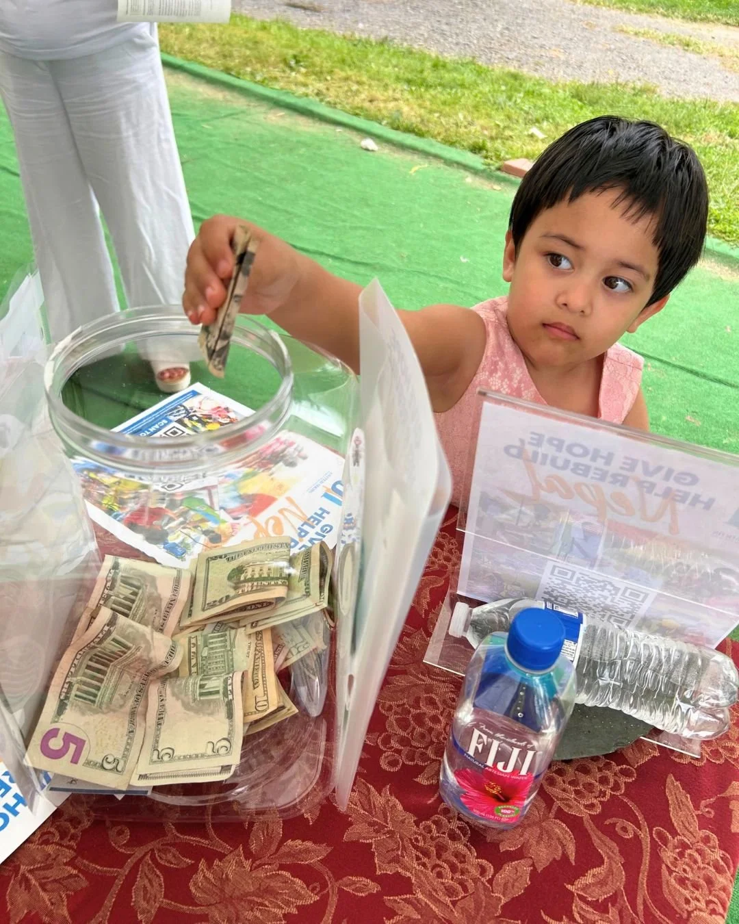 3 - Child Supporting Nepal Relief at NECC.jpg