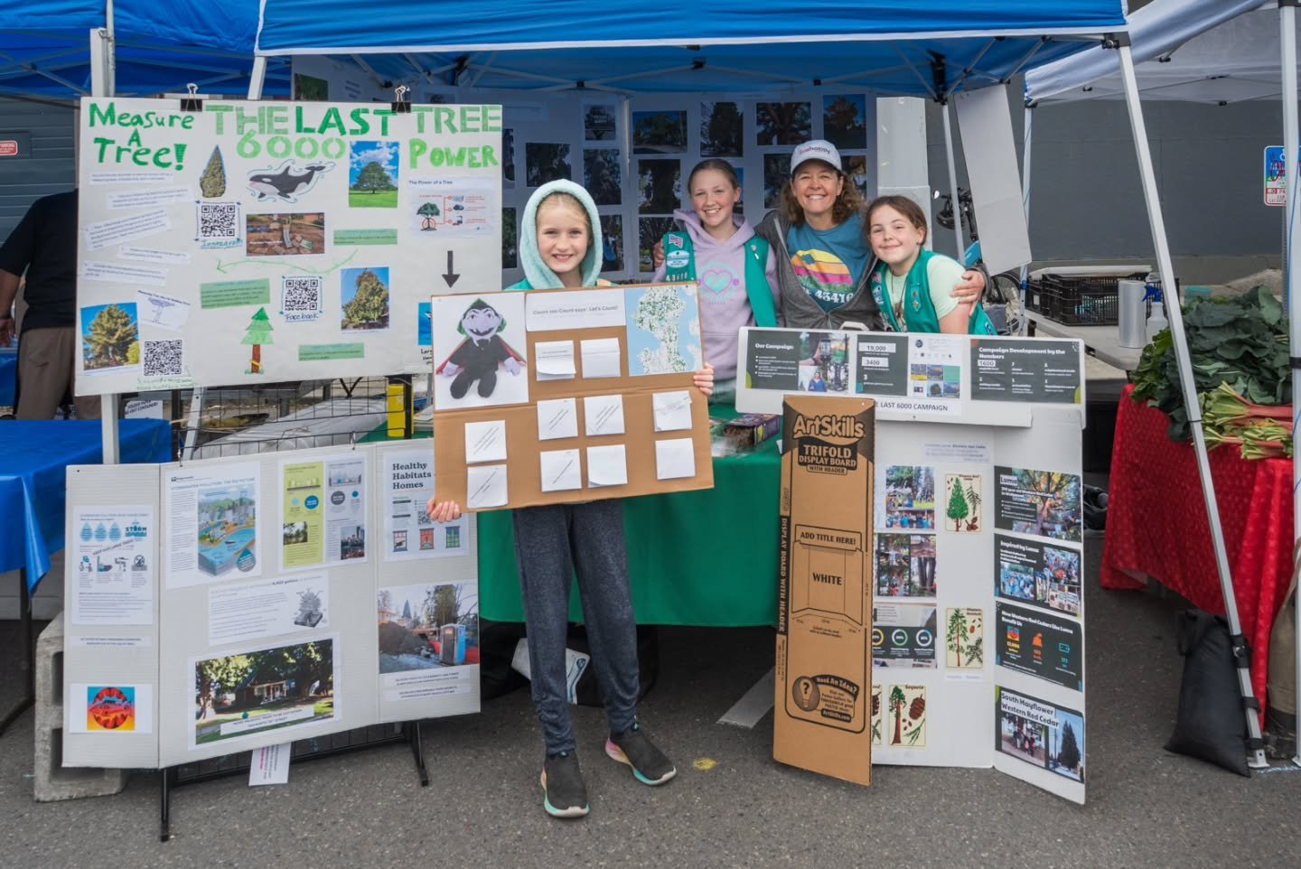 We were honored to have Girl Scout Troop #43416 represent the Last 6000 Campaign at the University District Farmers Market on Saturday, May 31st. Grace, Eloise, and Lexi spoke to dozens of people about the importance of large trees and how to measure