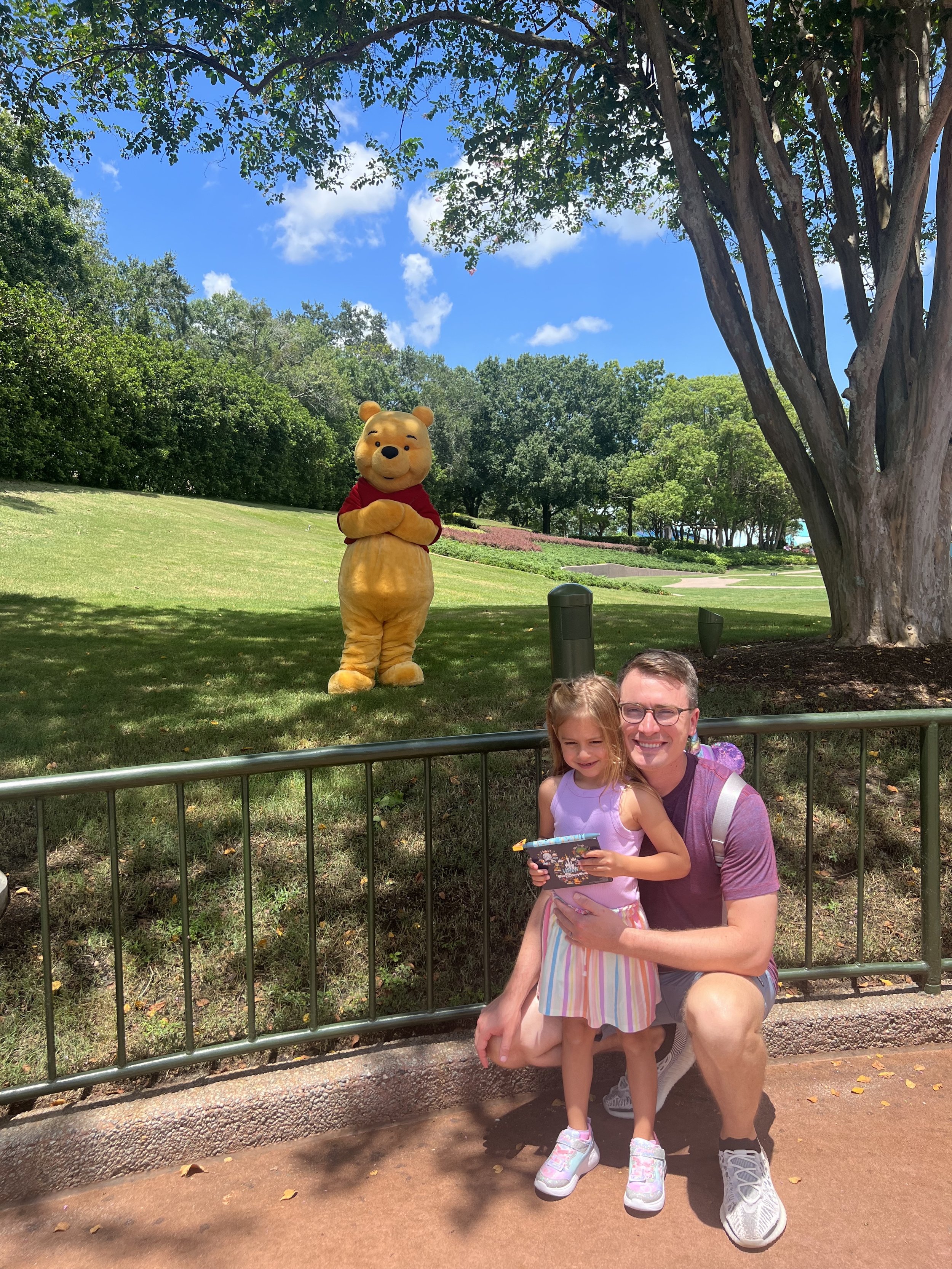 Levi and Kennedy with Pooh at Epcot.jpeg