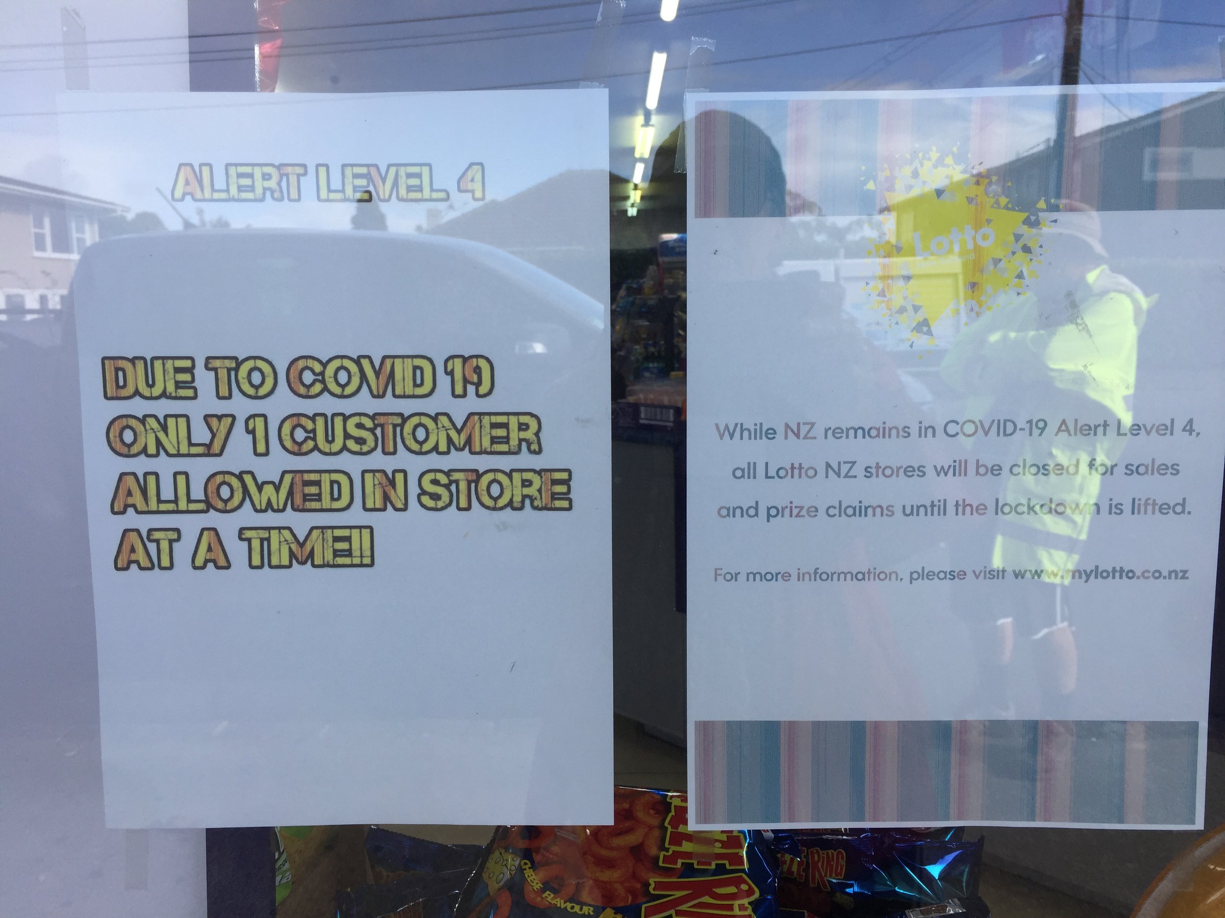 Signs in the store window. - Chris Perkins, 71, Auckland