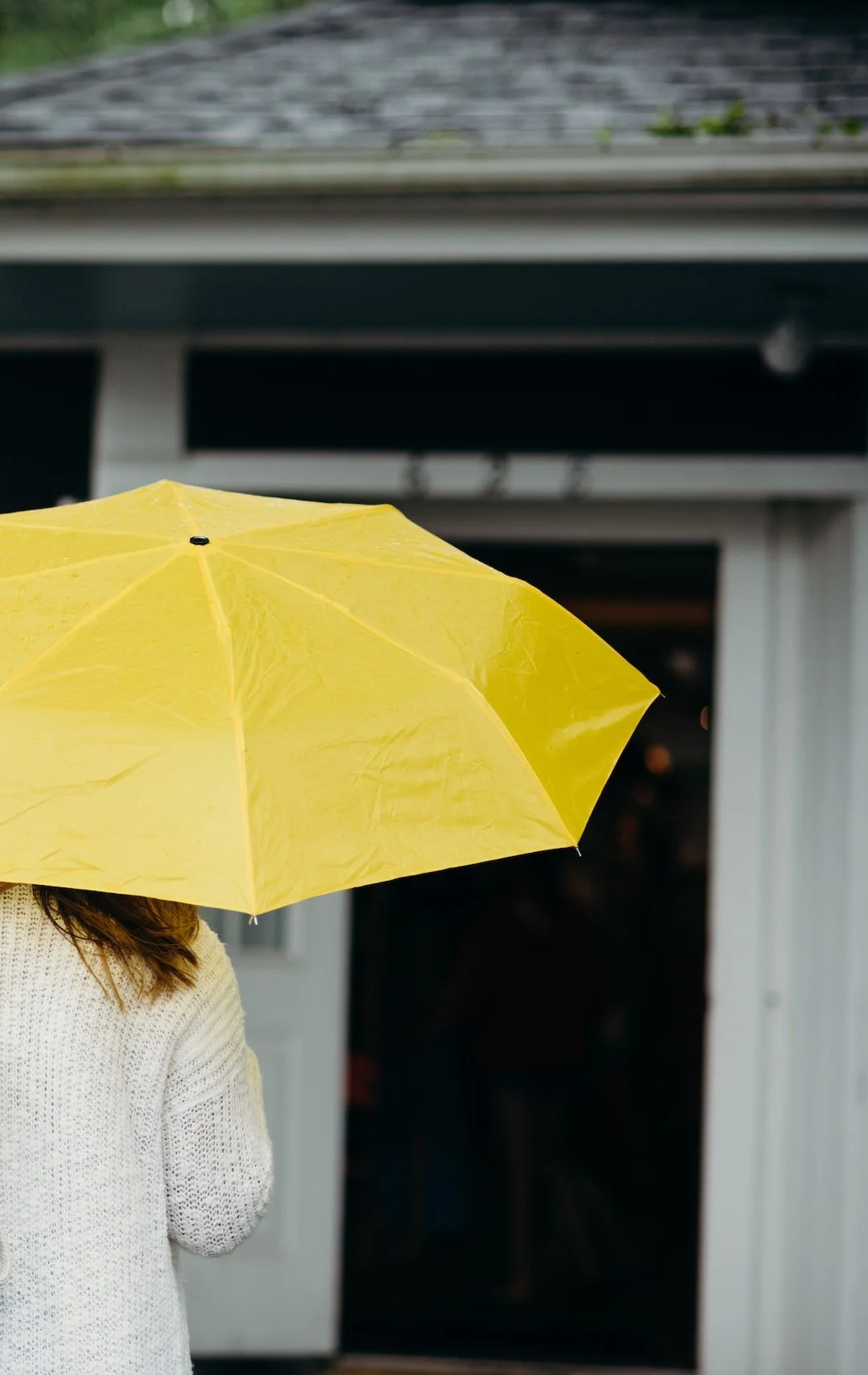 lady_under_yellow_umbrella