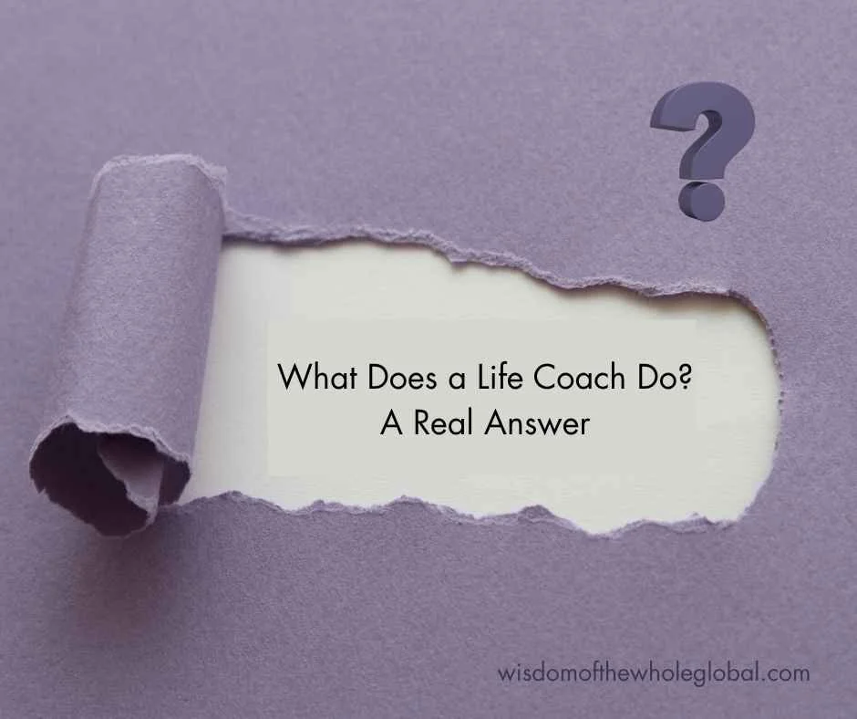Light purple paper torn to reveal the question "What Does a Life Coach Do? A real answer."