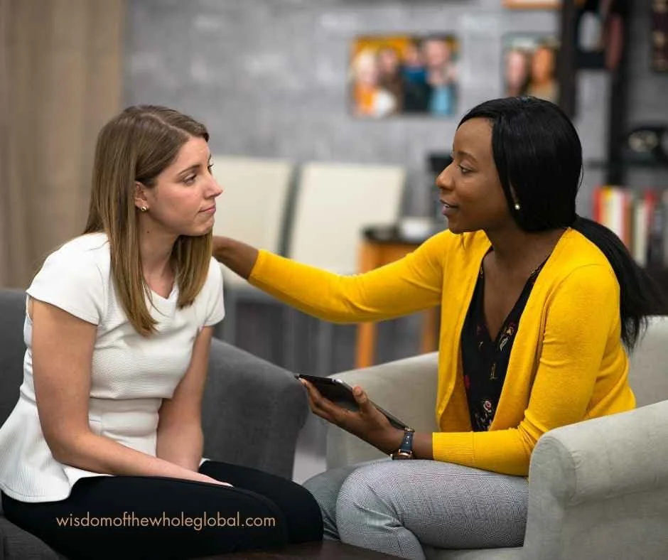 a woman supporting another woman