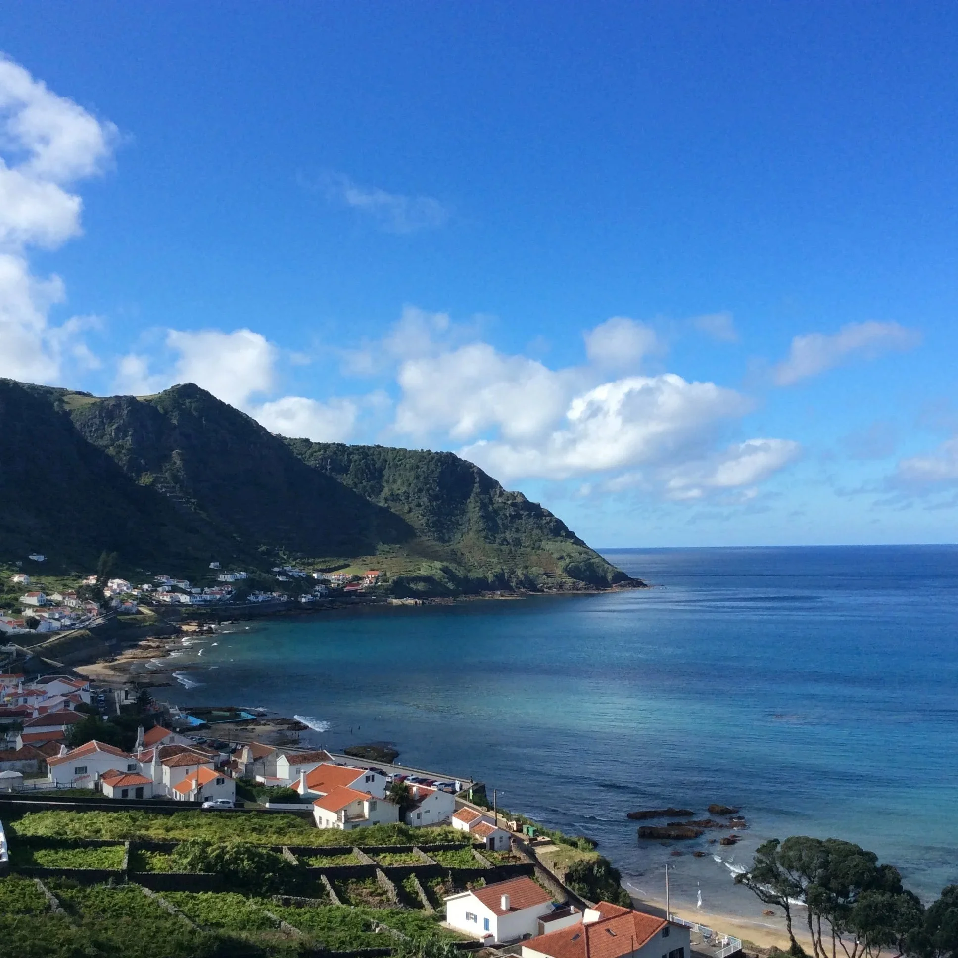 View from private retreat accommodation overlooking the blue green sea of São Lourenço bay, Santa Maria, Azores