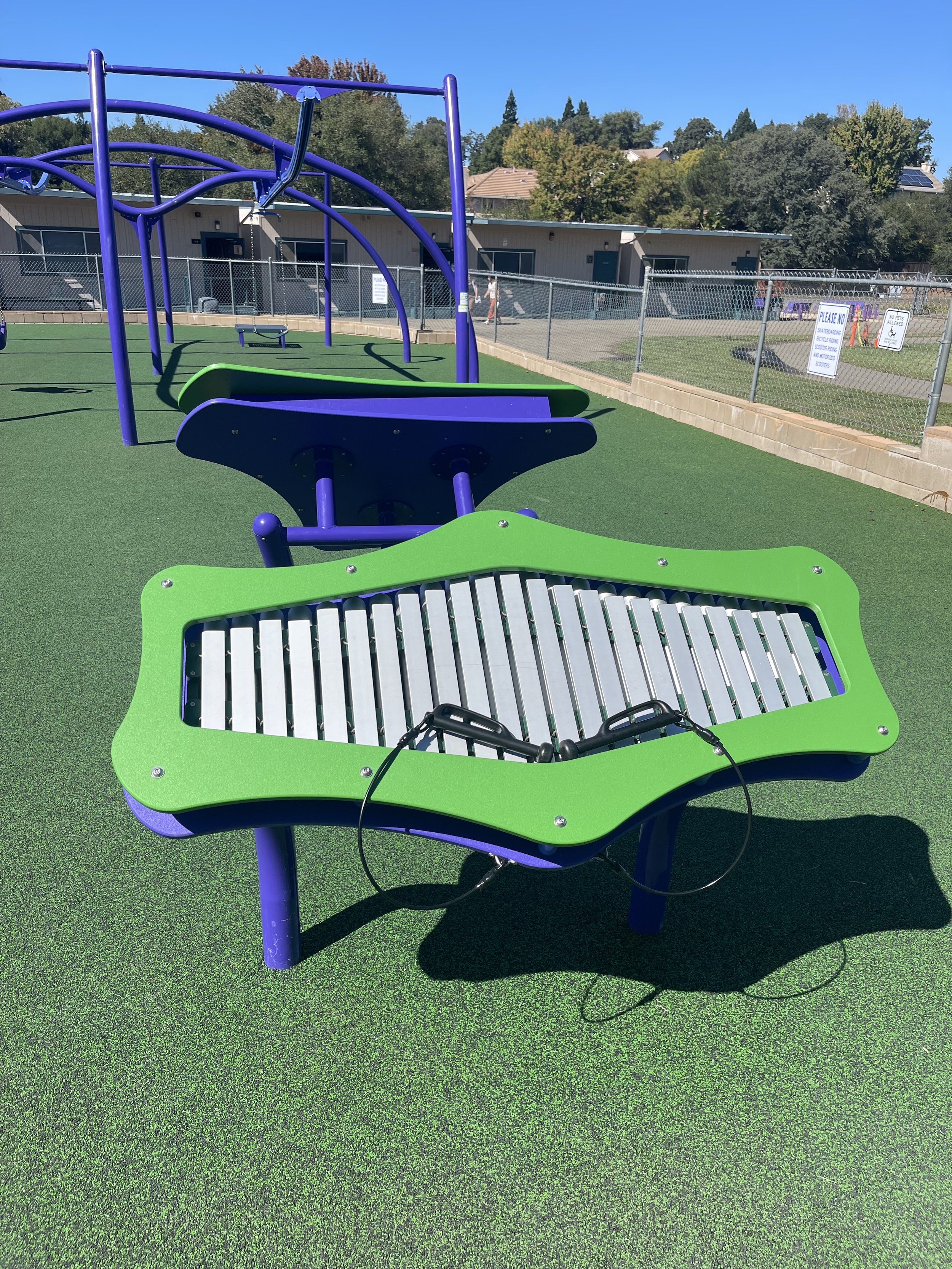 Sensory play areas stimulate senses through tactile, auditory, and visual play, benefiting children with autism or sensory processing disorders.