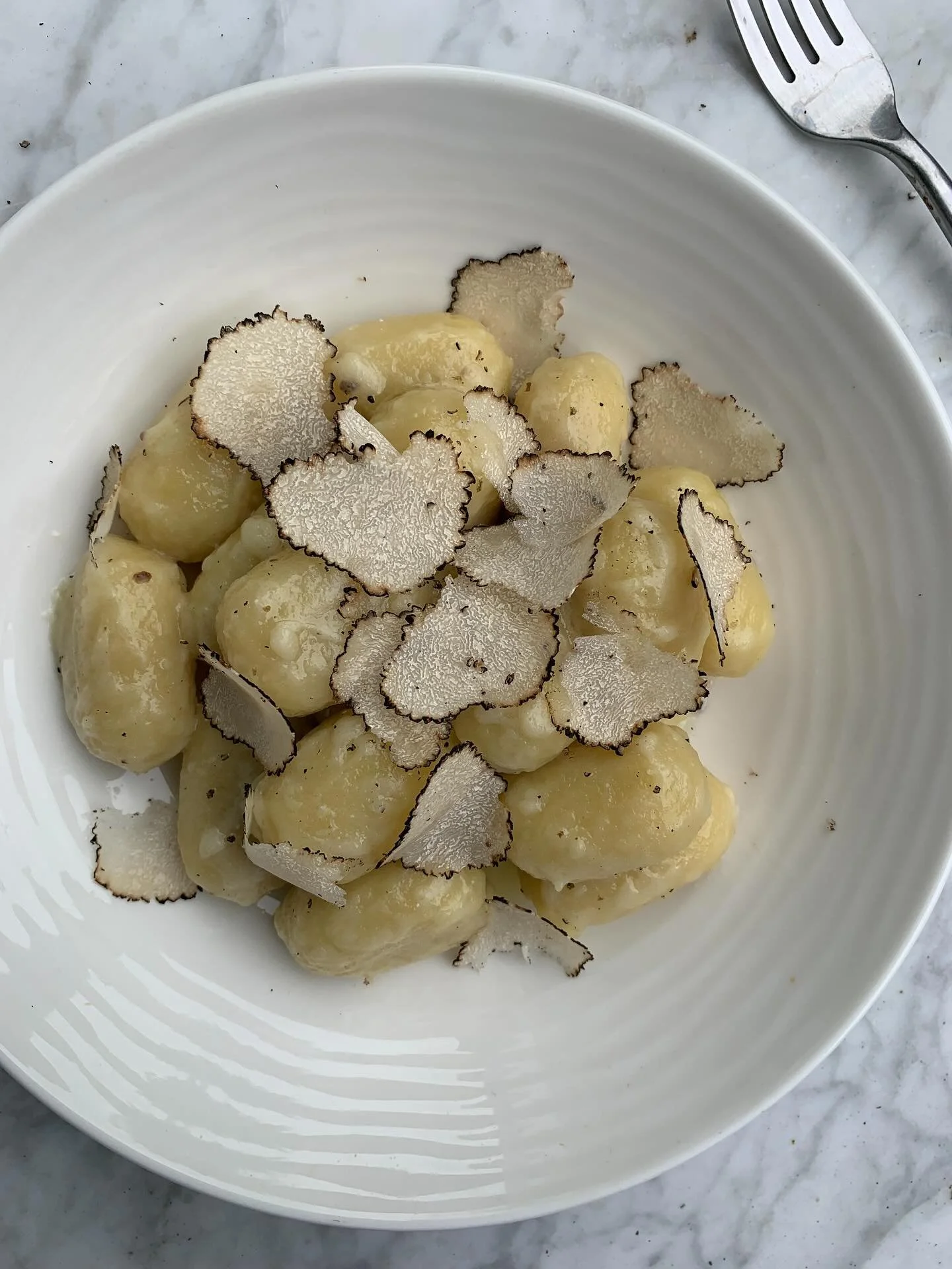 Soft gnocchi simply tossed in butter, Parmesan cheese and a splash of cooking water &mdash; a light, seasonal combination finished with the delicate flavour of freshly shaved black summer truffle. ✨

Plan your next weekend meal &mdash; and don&rsquo;