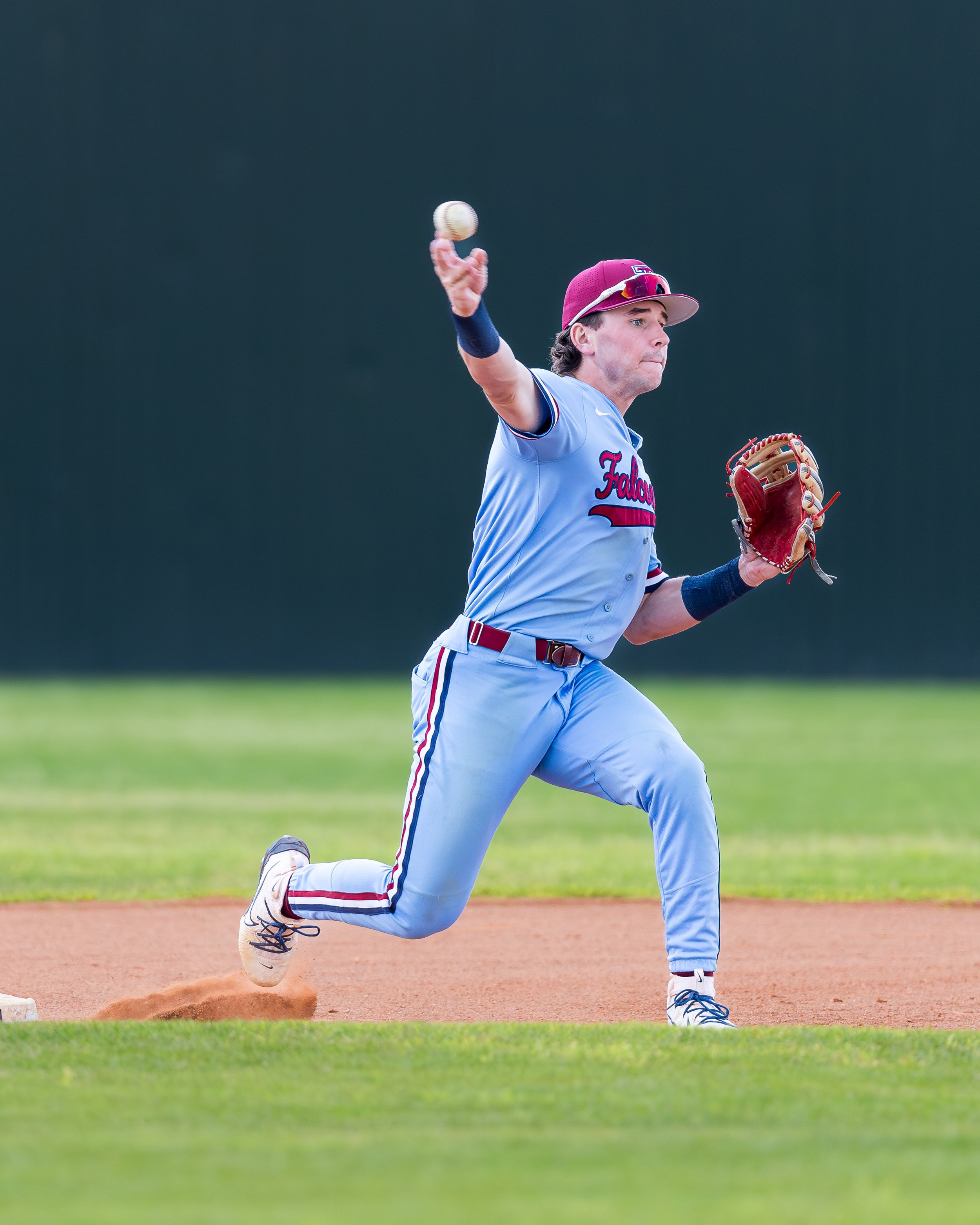 Boys baseball photography by Matt Powell who is a photographer in Katy, TX who specializes in portrait photography as well as sports and action photography.