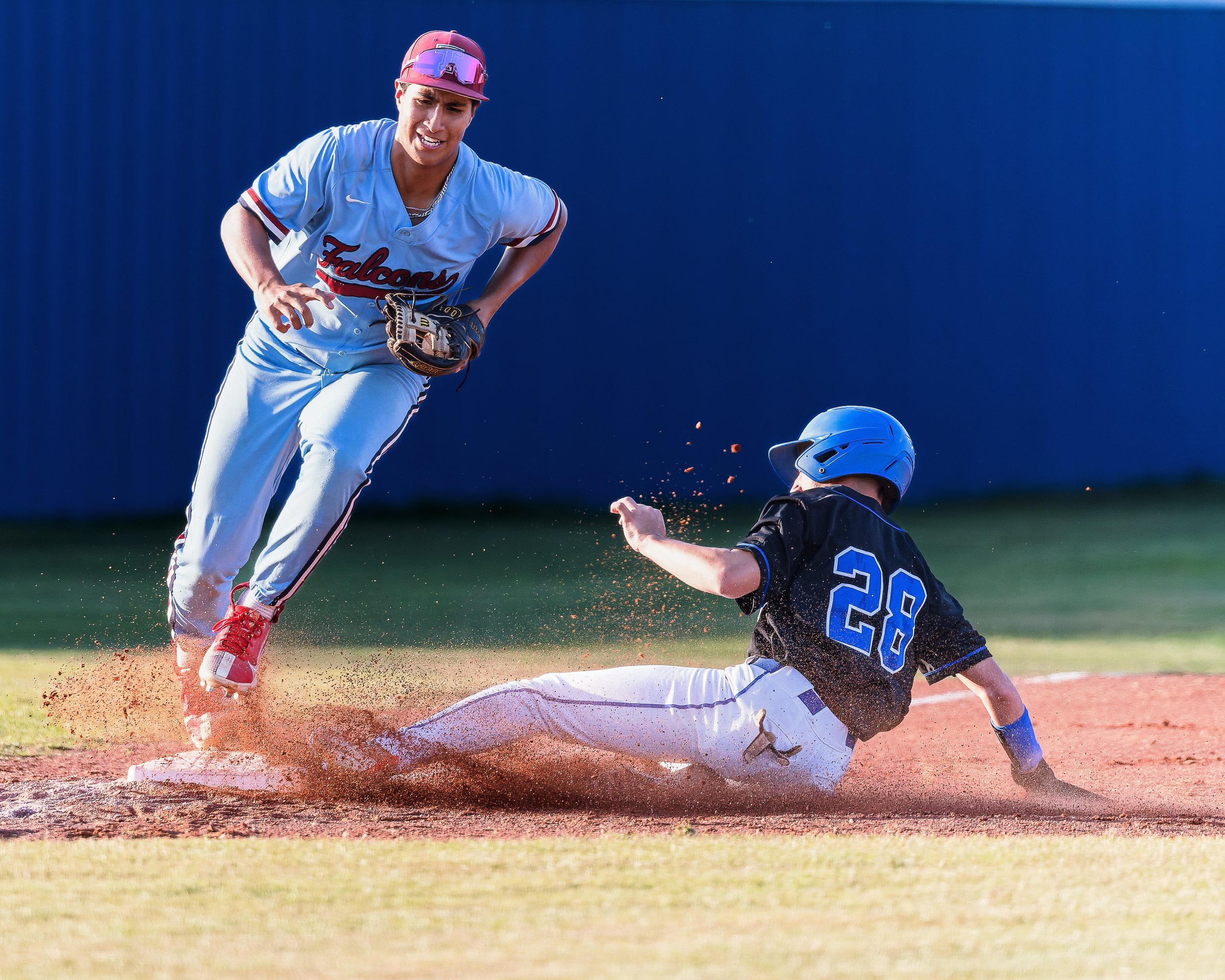 Tompkins High School Varsity Baseball shot by Matt Powell who is a photographer in Katy, TX who specializes in portrait photography as well as sports and action photography.