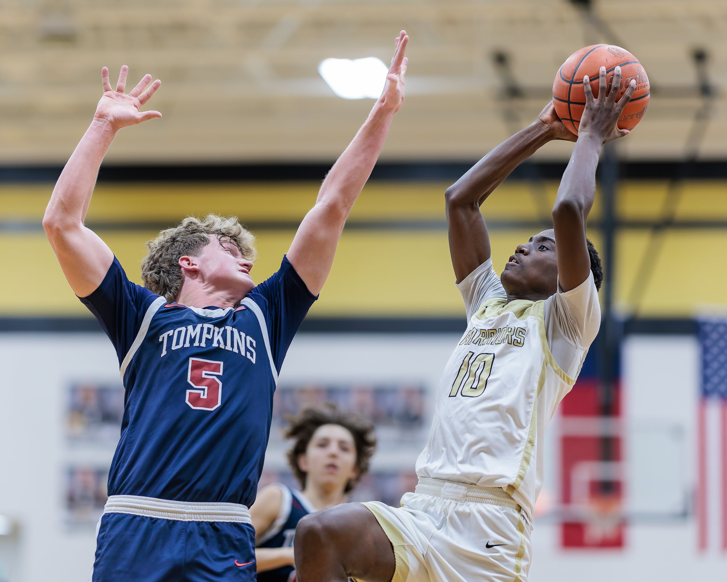 Basketball photography by Matt Powell who is a photographer in Katy, TX who specializes in portrait photography as well as sports and action photography.
