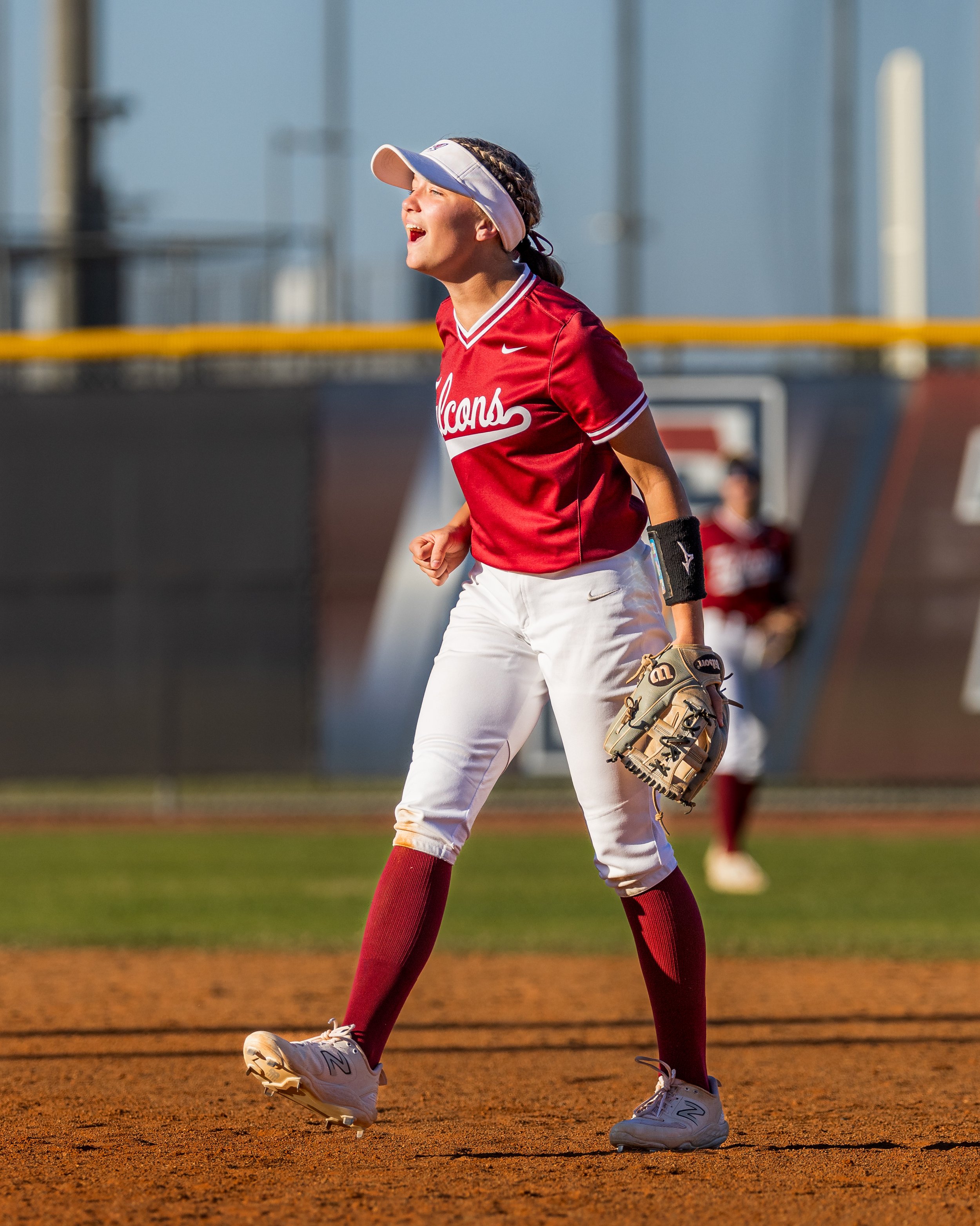 Tompkins High School Varsity Softball shot by Matt Powell who is a photographer in Katy, TX who specializes in portrait photography as well as sports and action photography.