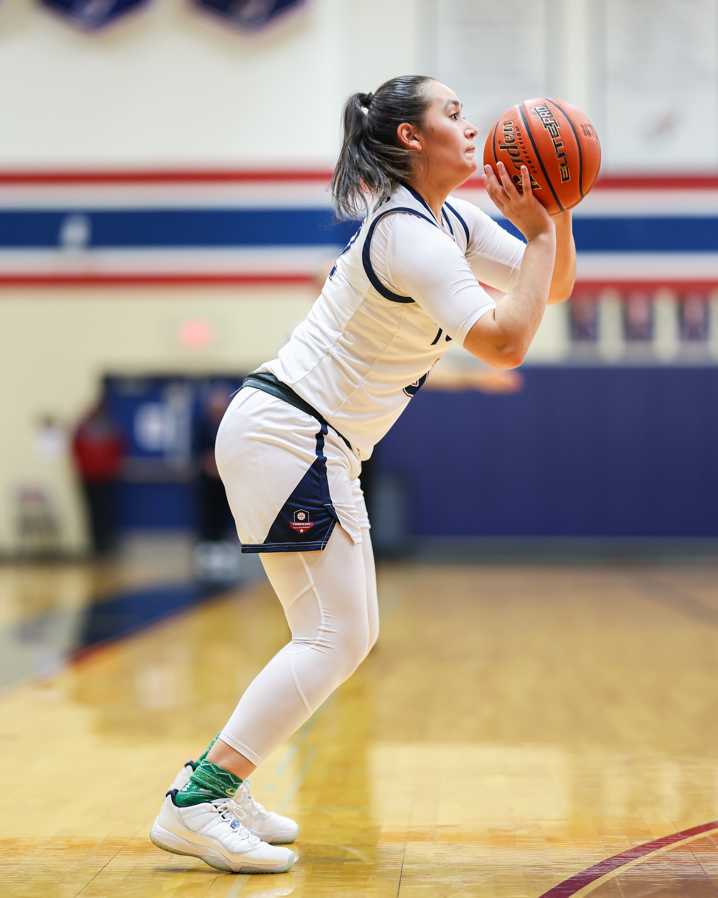 Tompkins High School Girls Varsity Basketball shot by Matt Powell who is a photographer in Katy, TX who specializes in portrait photography as well as sports and action photography.