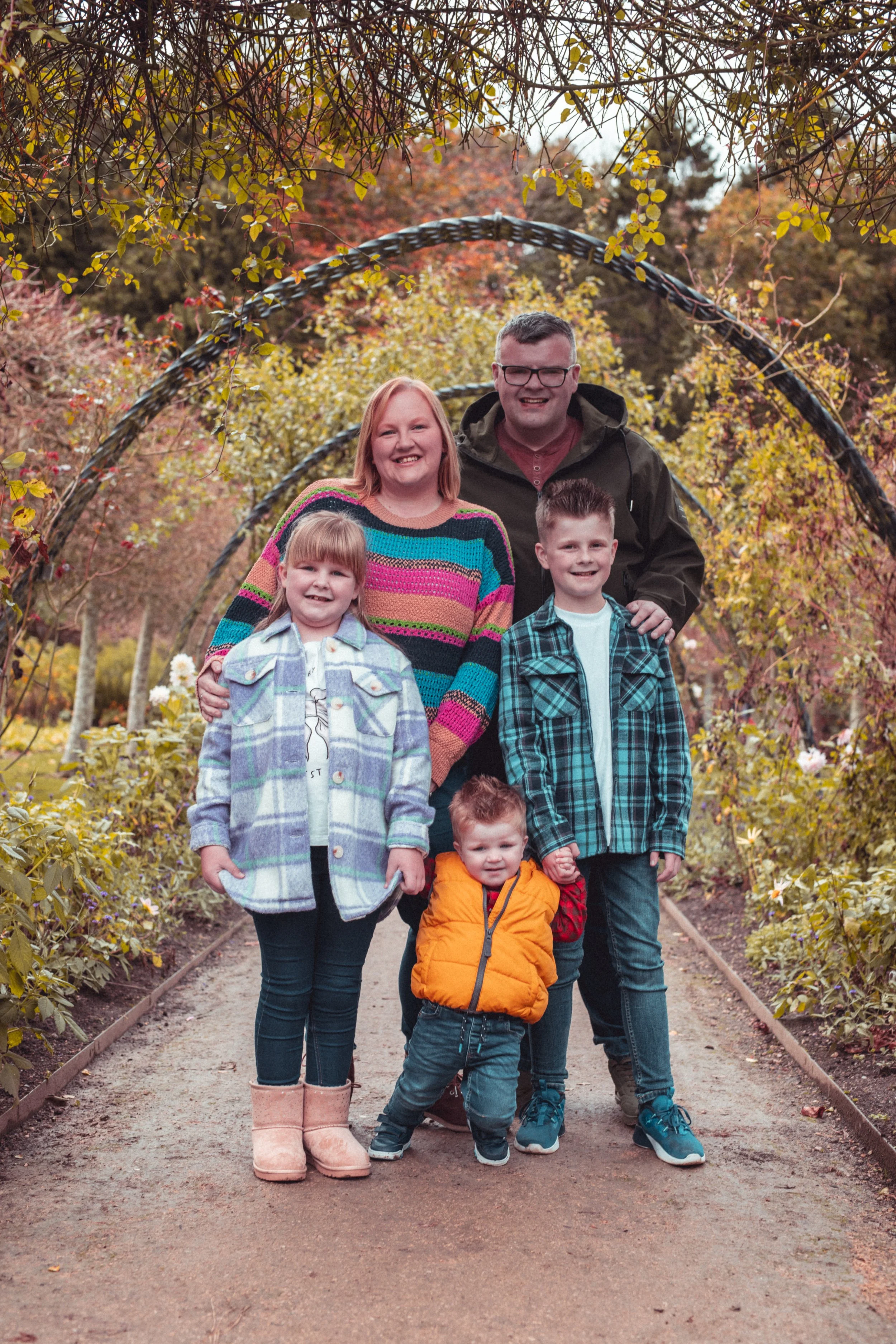 a happy family photo, captured in the walled garden in Bangor Co.Down Northern Ireland