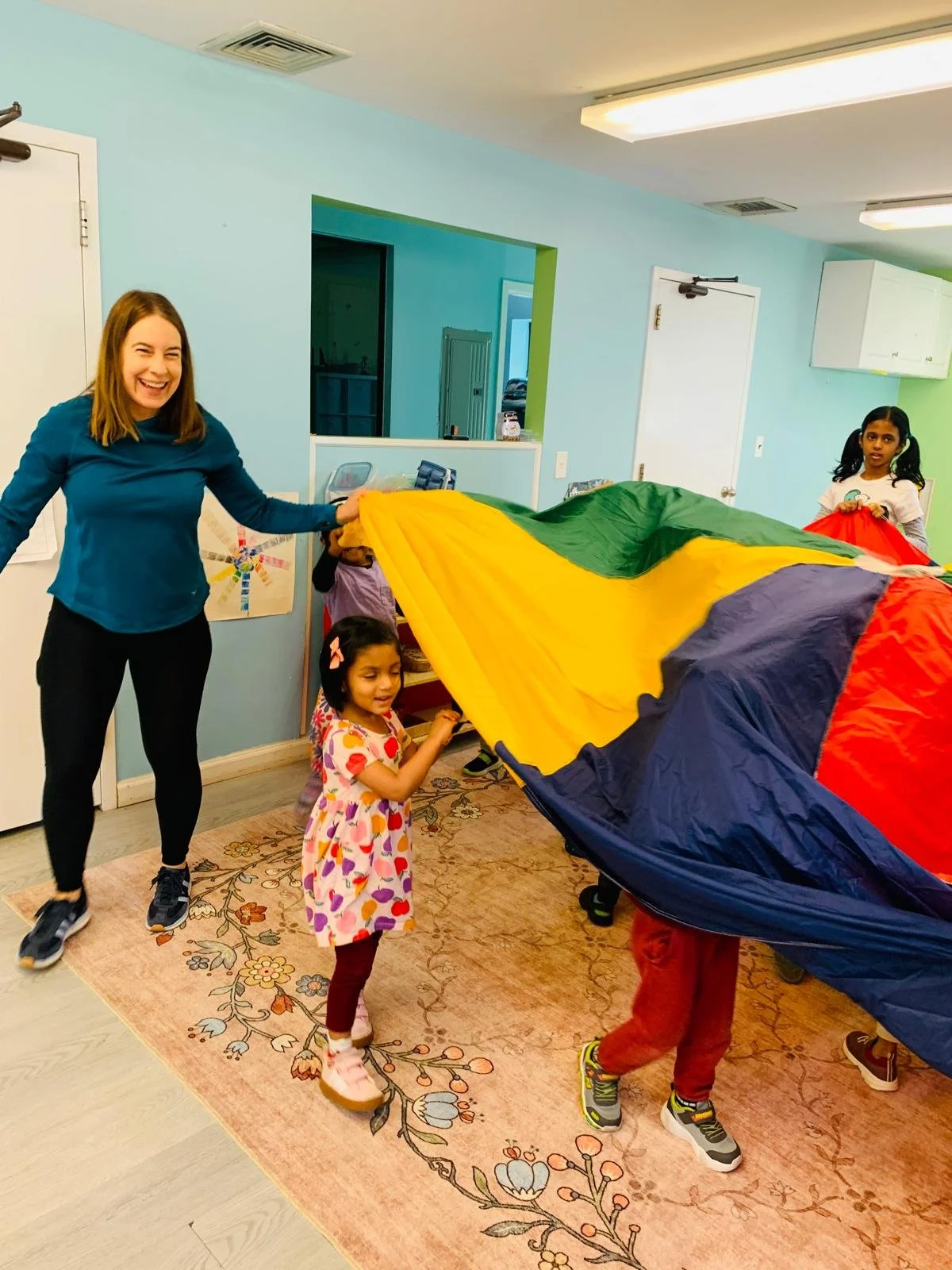 Parachute with Ms Laurie.jpeg