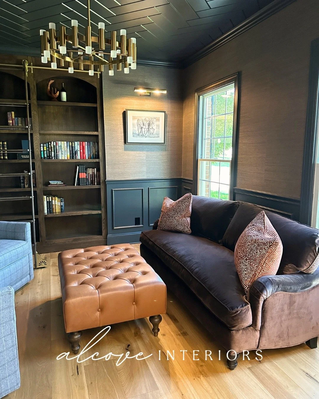 A room designed for pause.
Layered textures, tailored seating, and warm wood tones come together to create a library that feels collected, comfortable, and quietly refined.

At Alcove Interiors, we design rooms the way a good library is built &mdash;