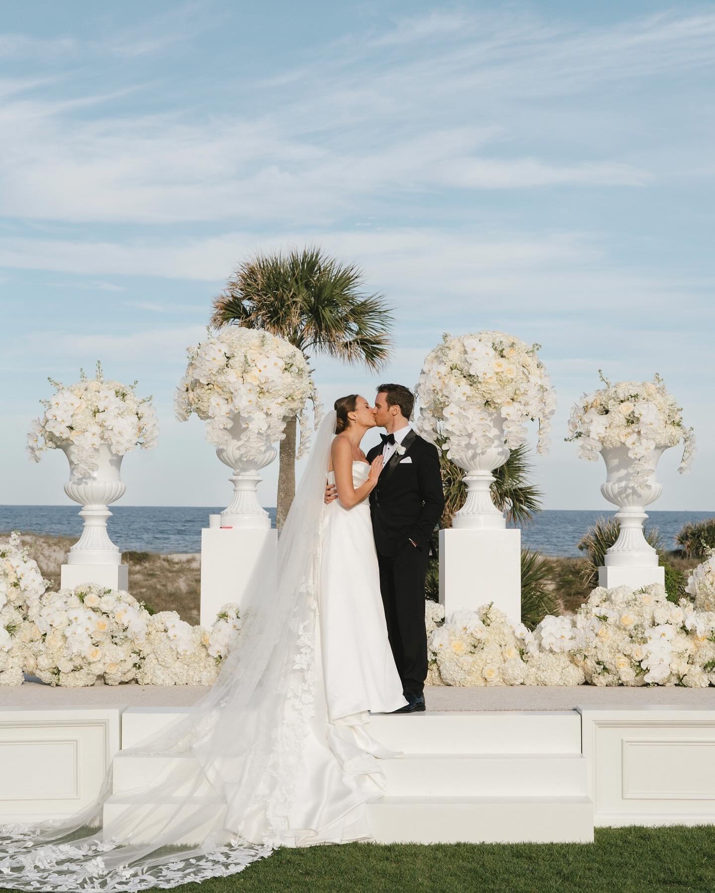 Stepping into a world of pure elegance and bliss with K+C on their all-white wedding day 🕊️ 

Planning &amp; Design: @collinskormanevents 
Venue: @ritzcarltonameliaisland 
Photographer: @gaylebrooker
Videographer: @h2hmedia 

#ameliaislandwedding #a