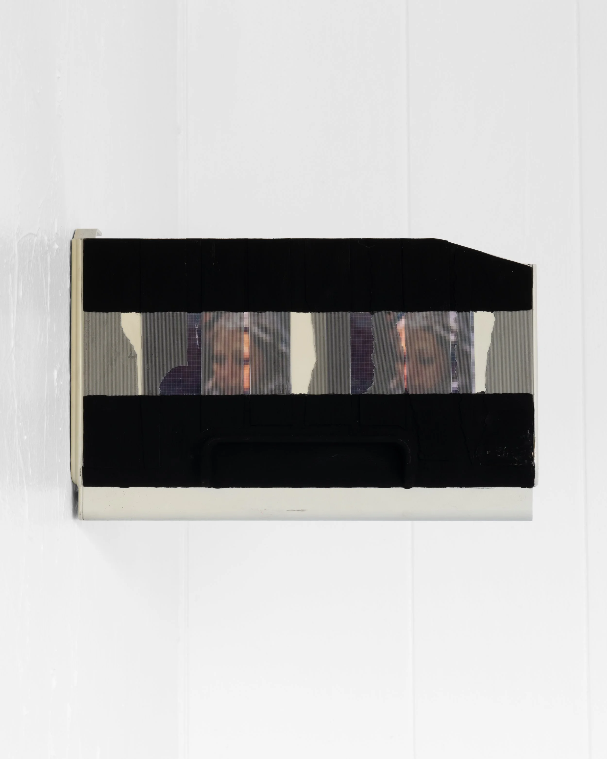 Maddie Butler
 IMG_1400.m4v (blizzard cigarette) , 2025
E-waste, inkjet prints, resin, paint
7 ¾ x 2 ¼ x 12 in.