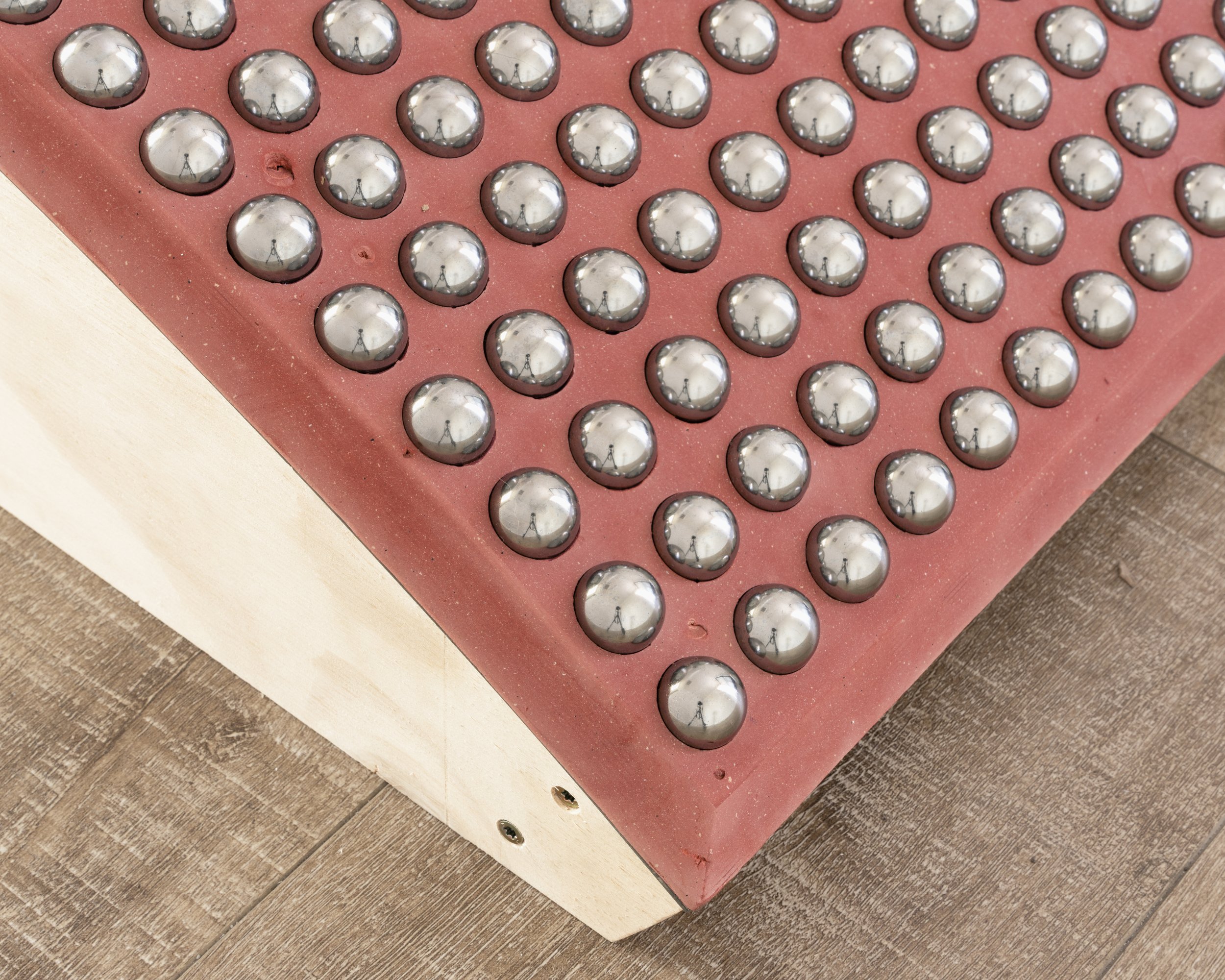 Max Lofano
 Carrier  (detail), 2024
Steel, rubber, wood
11 x 36 x 57 inches