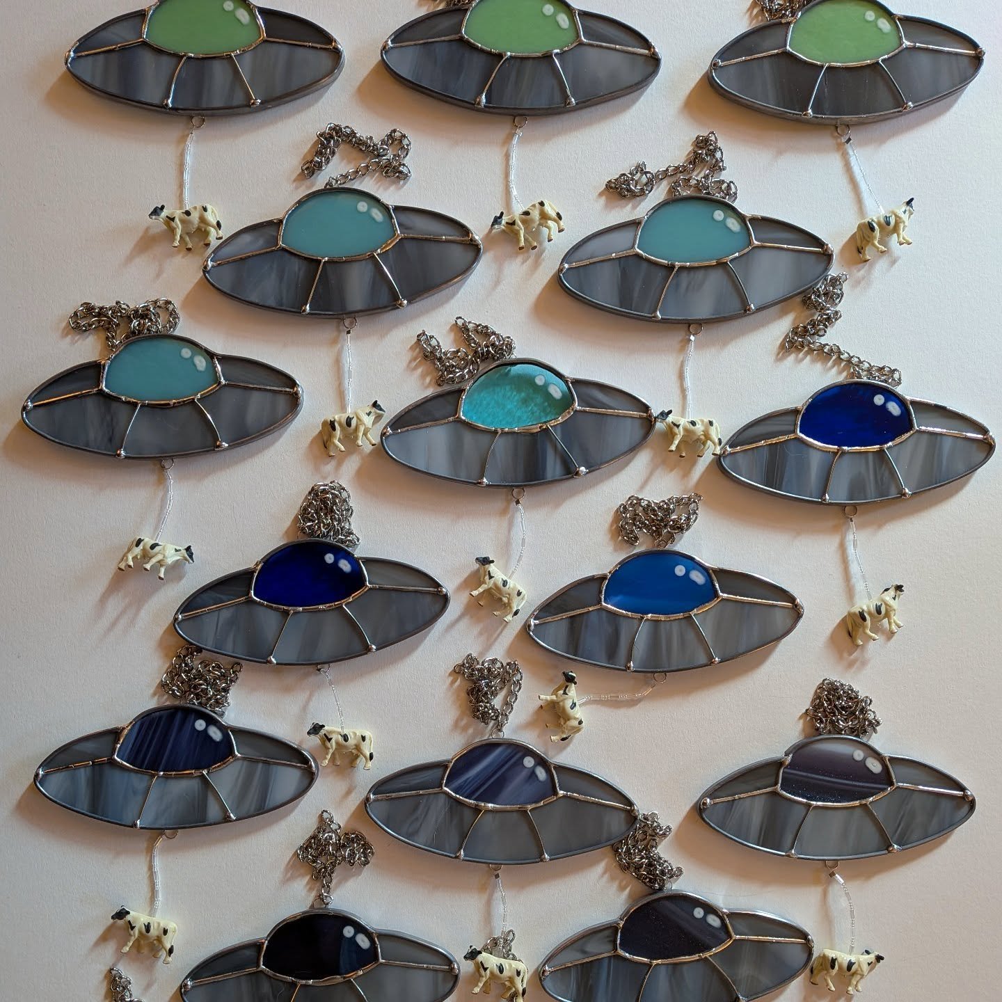 Me and my totally normal amount of stained glass UFOs are going to be at the @dark.market.pop.up this Sunday from 2-8PM at @blackwaterpdx !

Come say hey!