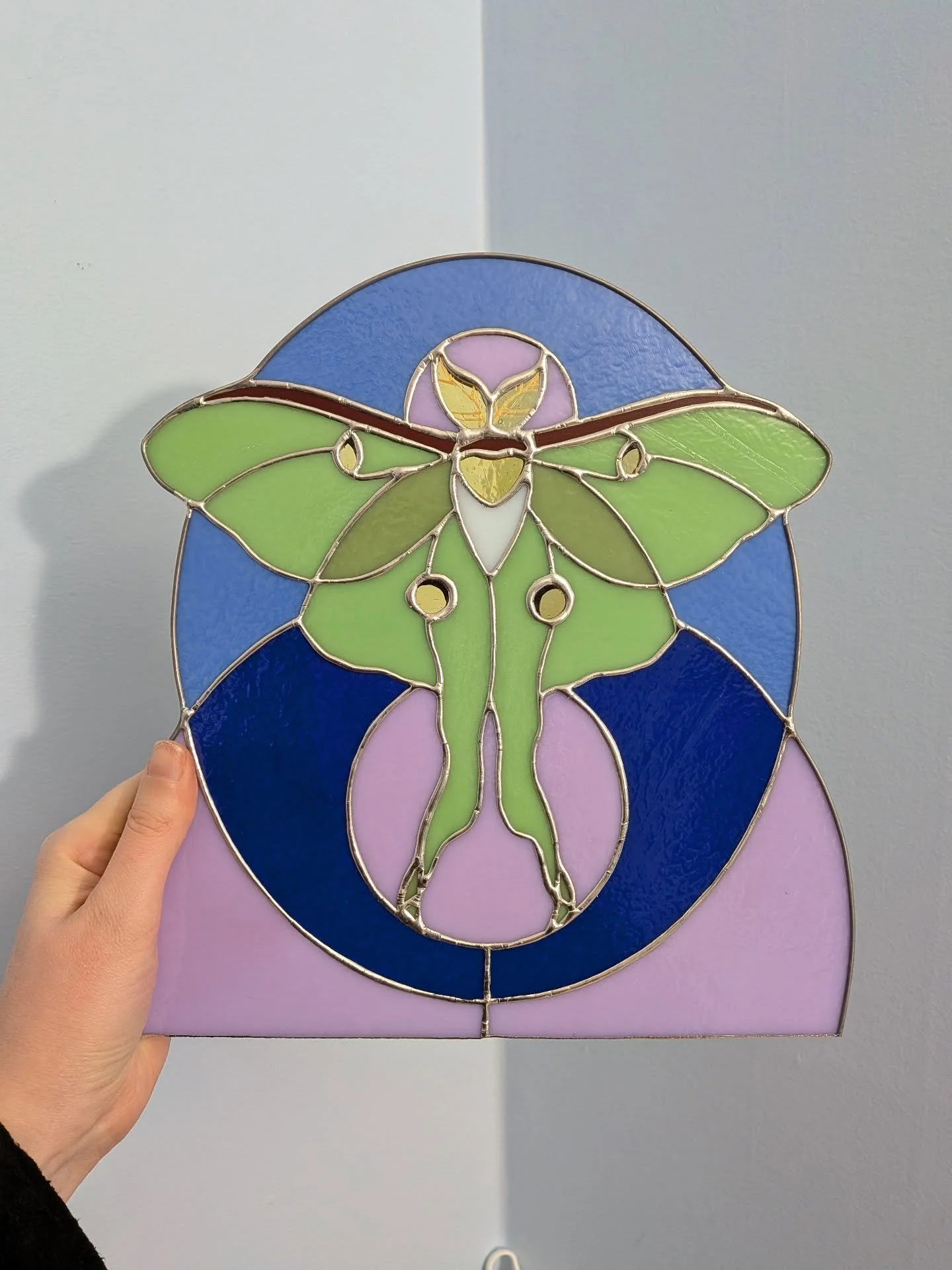 Different from my usual style, but a good challenging commission. Symmetry is hard, y'all. 

#stainedglass #stainedglassartist #spookybutcute