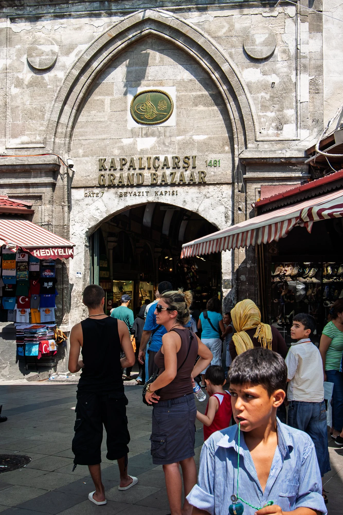Crowd entering the Beyazıt Gate of the Grand Bazaar, Istanbul, under the 1461 stone arch — Canon EOS 40D