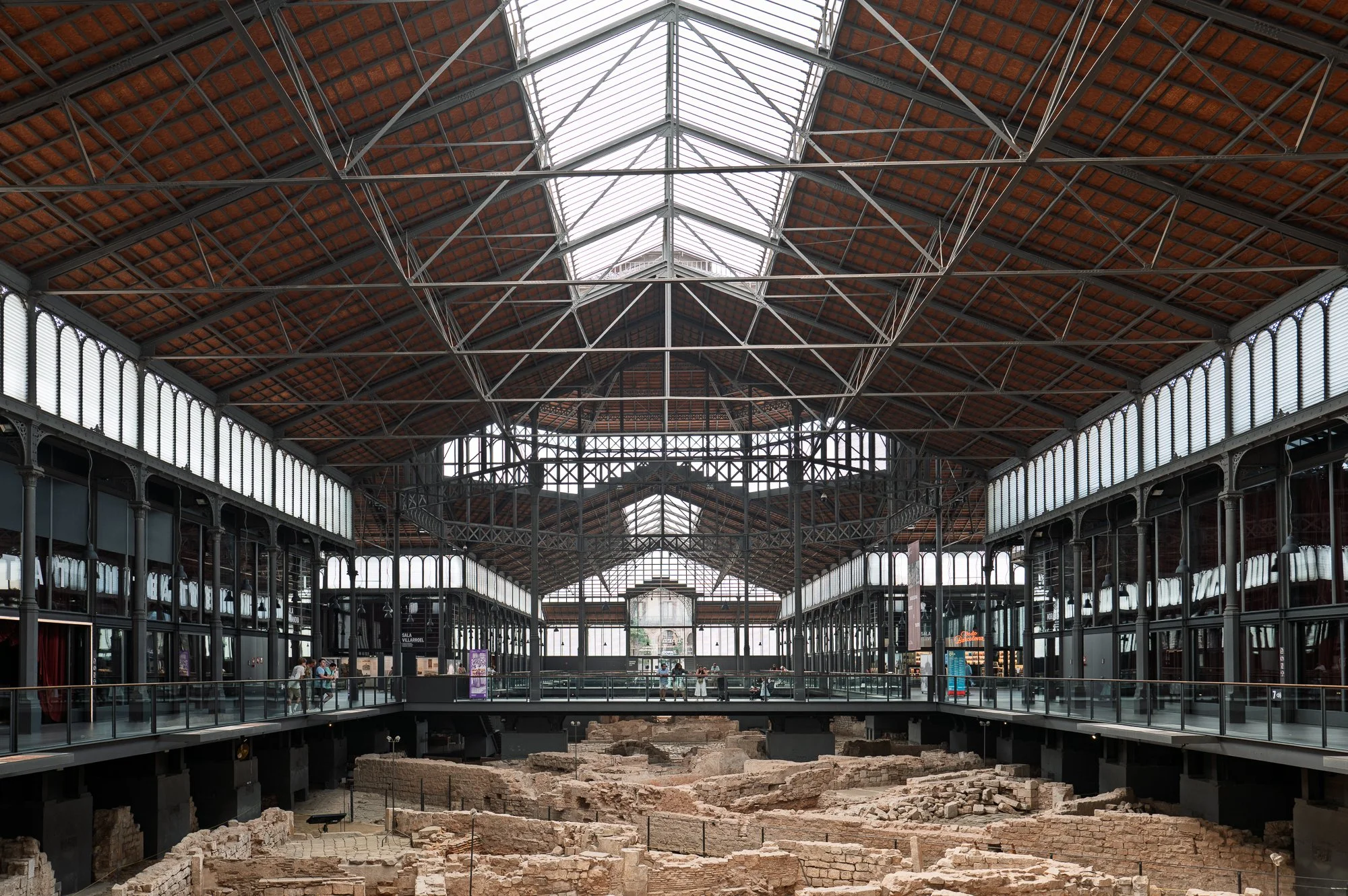 Iron nave and central skylight above the Mercat del Born ruins, Barcelona — Leica Q3