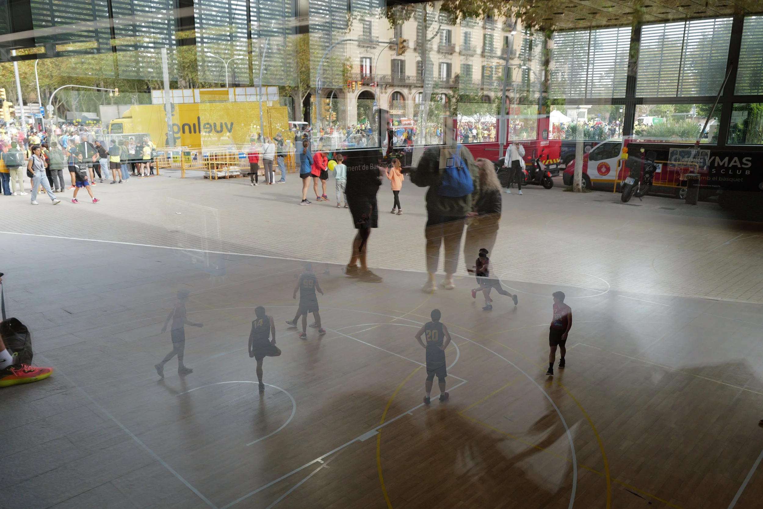 Reflections of street life in a multi-level glass in Barcelona – bCLPhoto