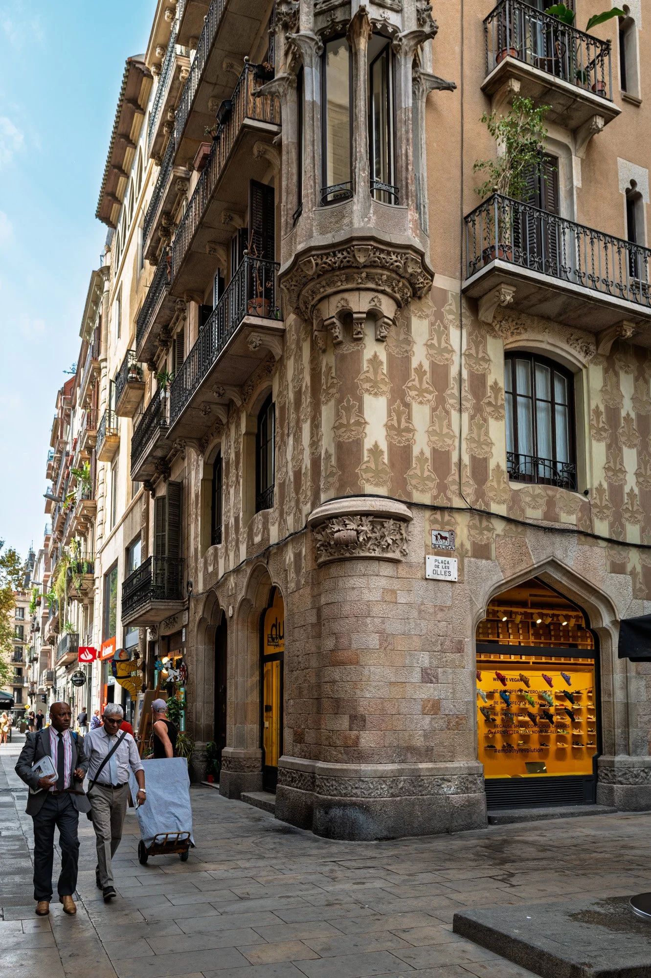 Modernist corner building with iron balconies in El Born — Leica Q3