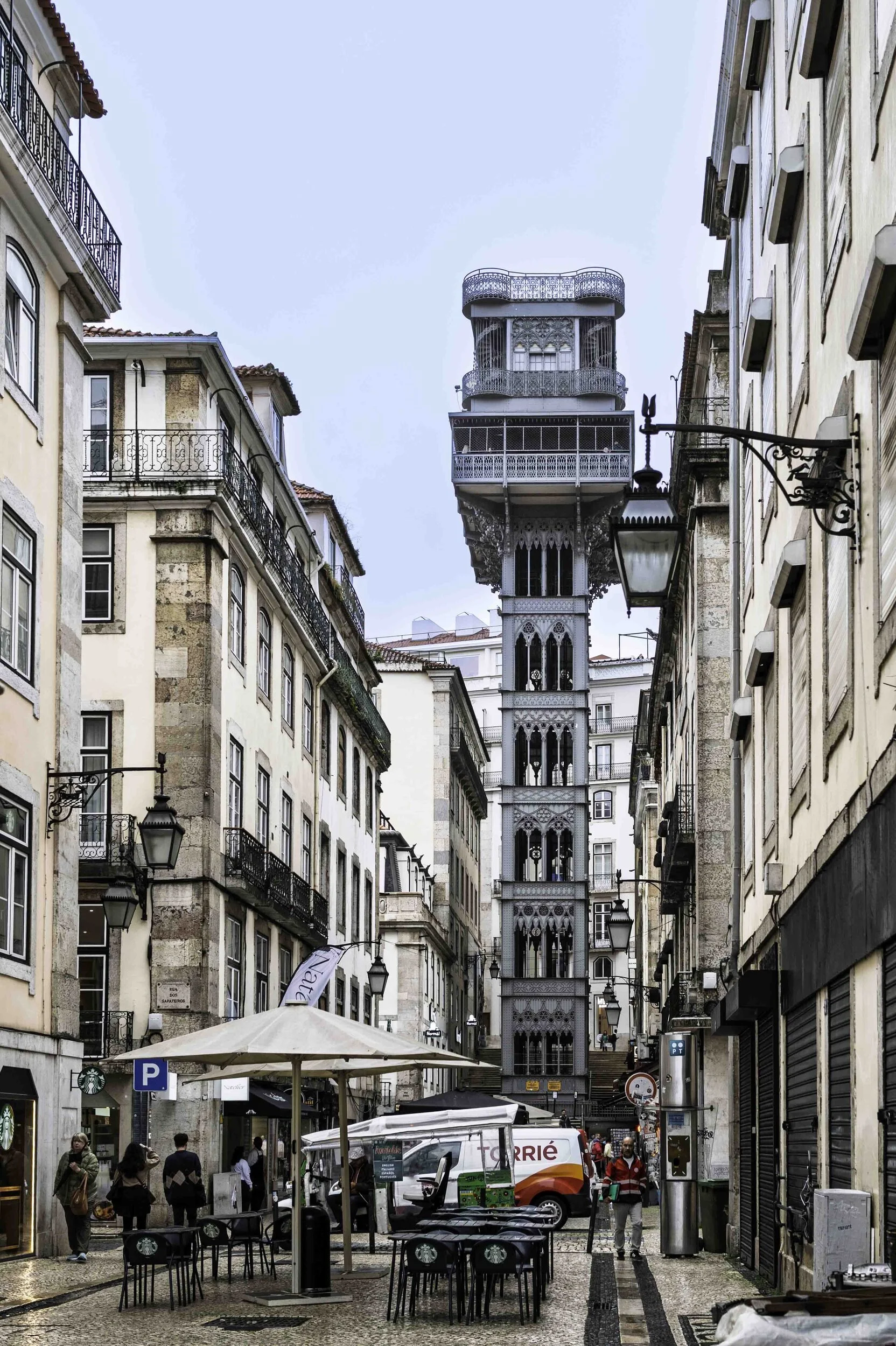 Elevador de Santa Justa framed by the street, Lisbon — Leica Q3
