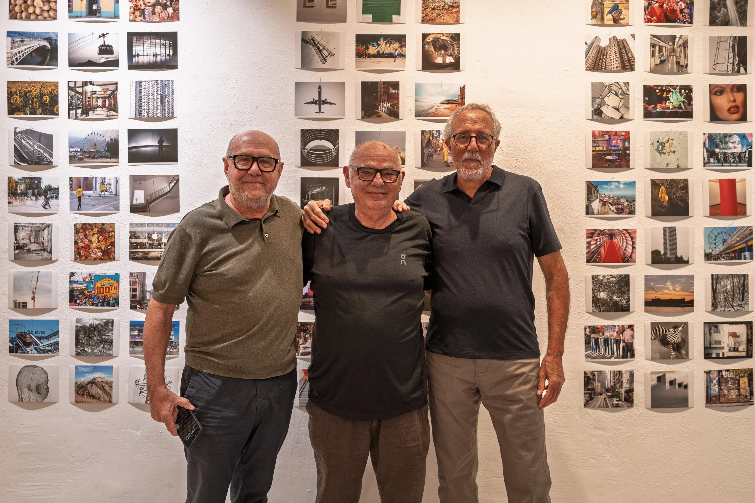 Photographers Jordi Comes, Cosme Lapena and Benet Solina before their prints, espai[b] Barcelona — Leica Q3