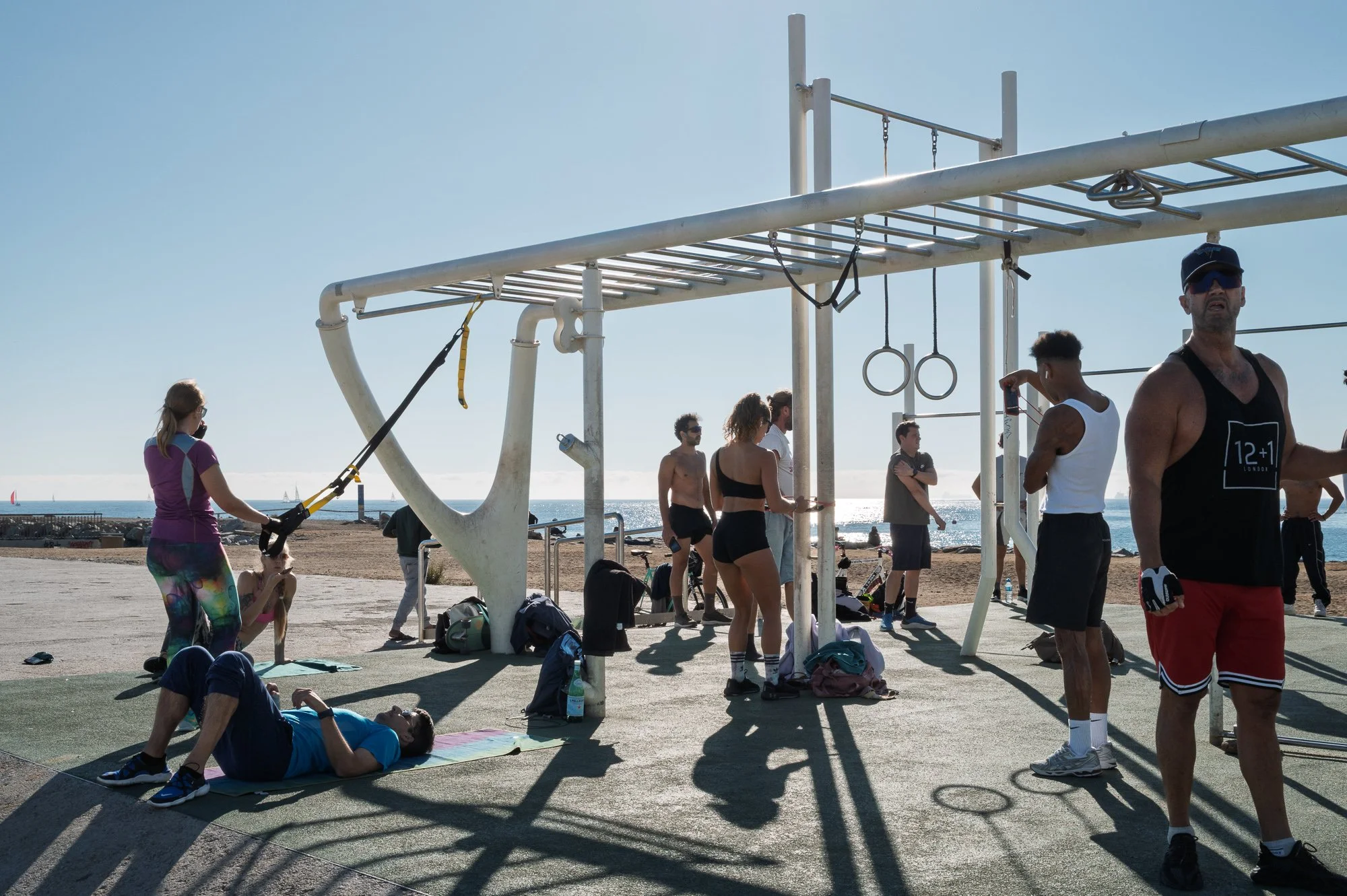 Calisthenics park on Barceloneta beach, Barceloneta street photography in backlight — Leica Q3