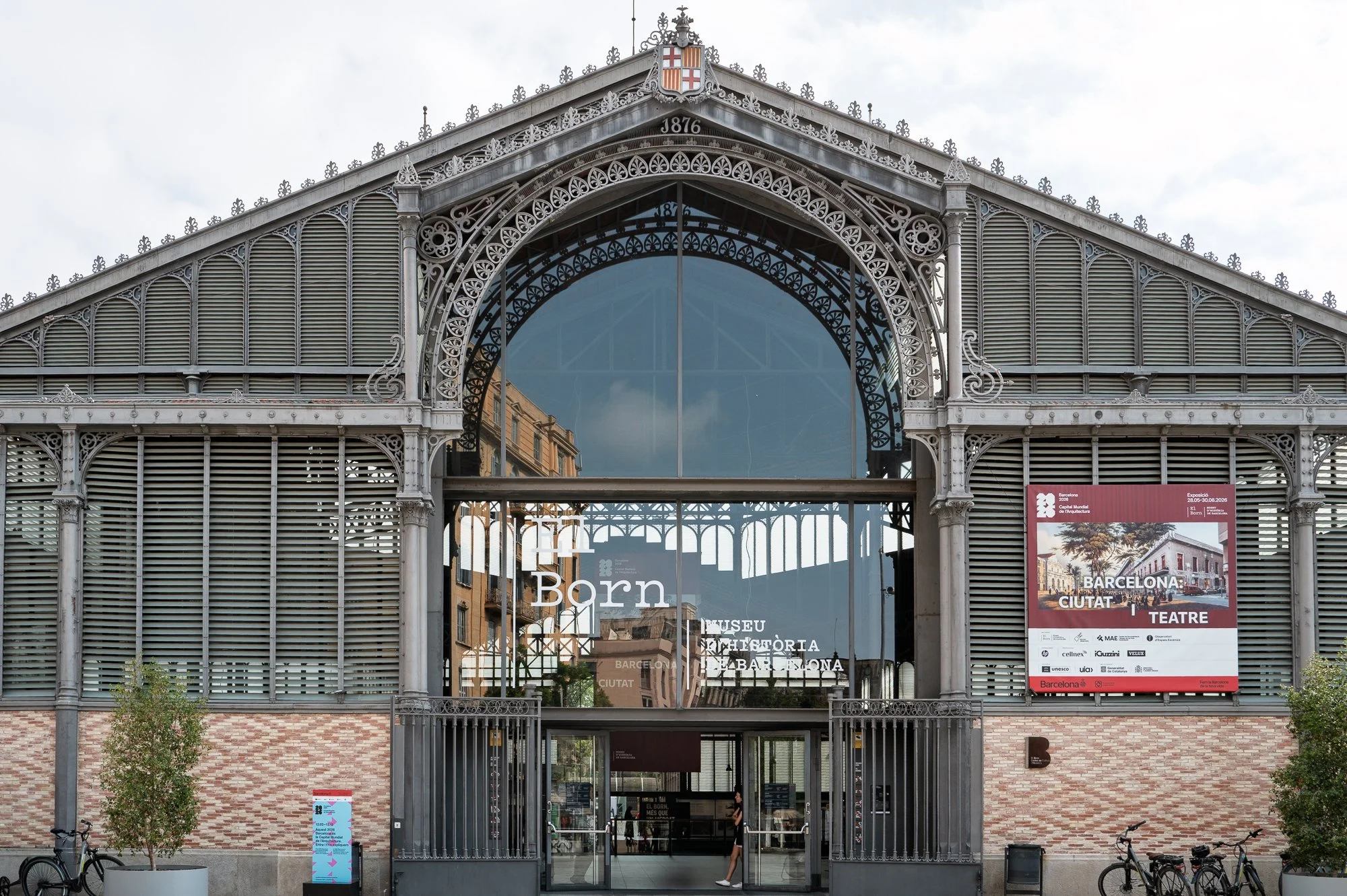 Cast iron façade of the Mercat del Born with the 1876 date on the pediment — Leica Q3