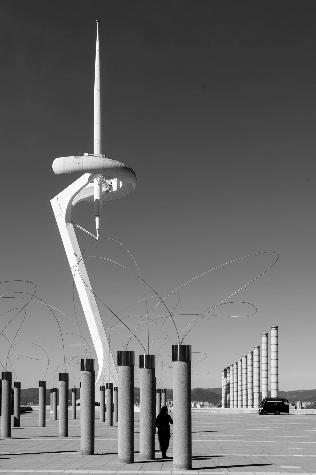 Calatrava telecommunications tower with figure, Barcelona modern architecture — Sony A7R IV