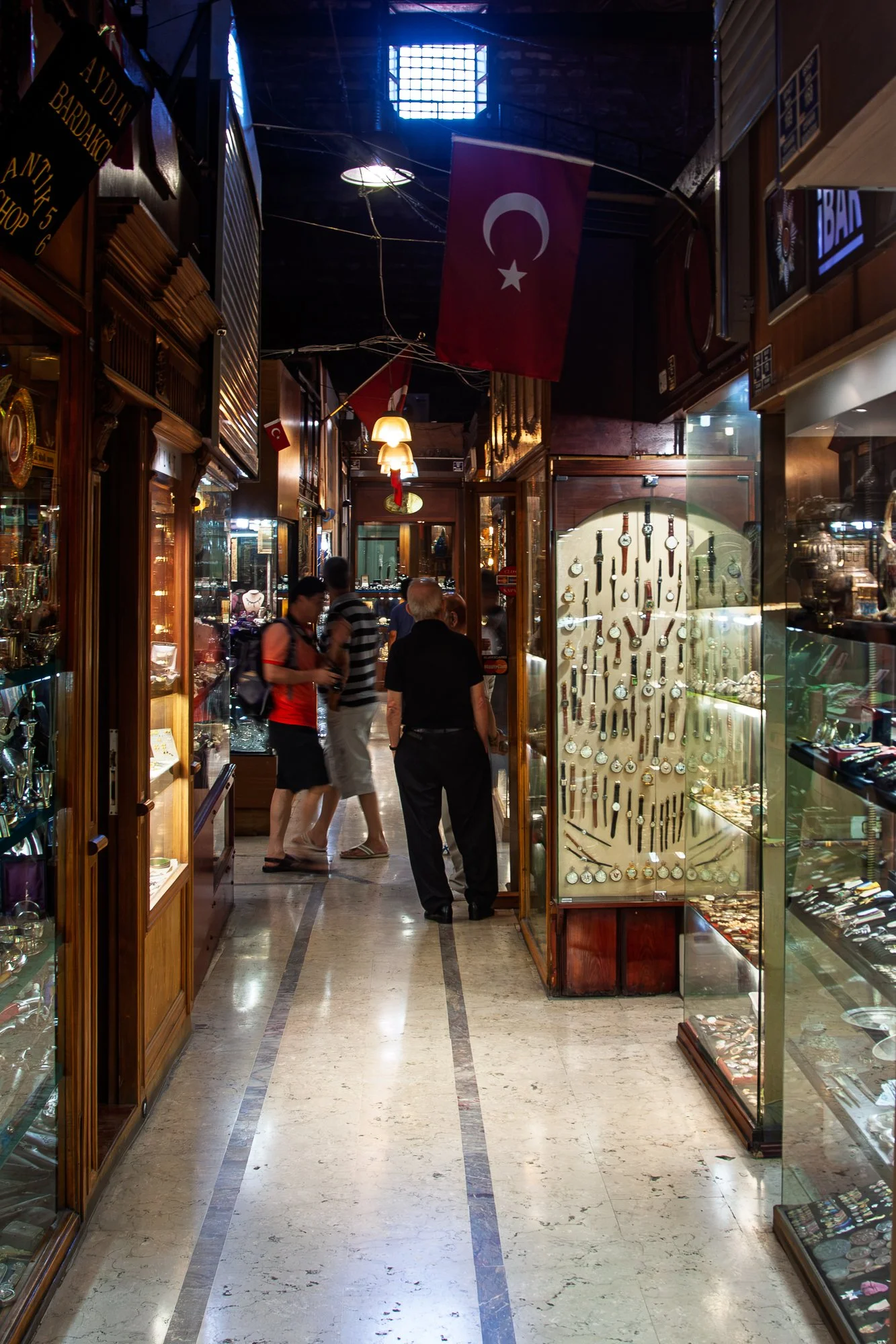 Dark wood and marble jewellery passage with a Turkish flag, Grand Bazaar, Istanbul — Canon EOS 40D