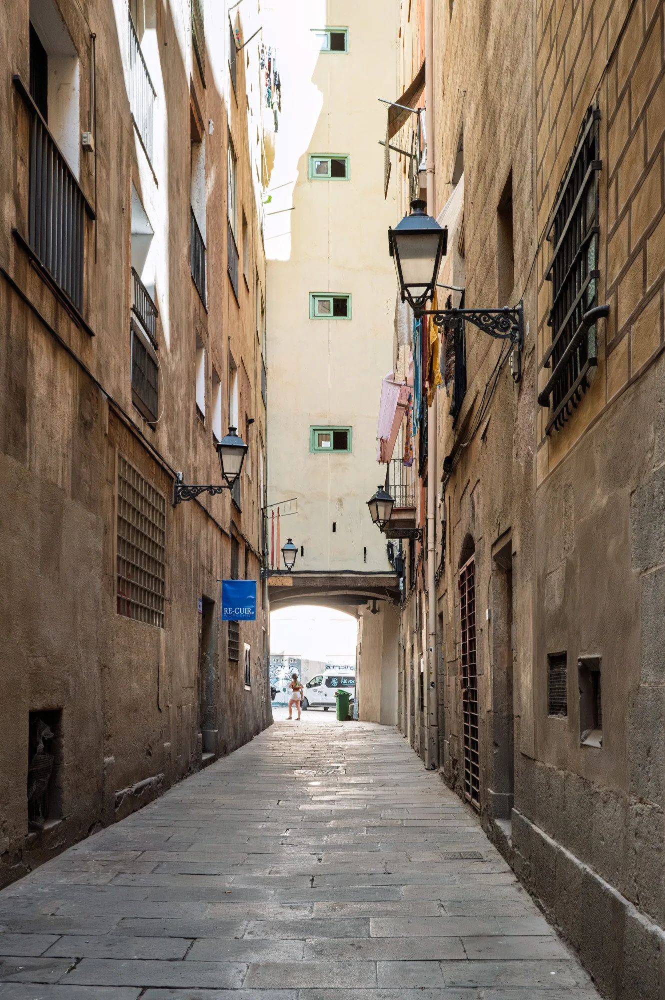 Gothic stone bridge arch over medieval street near Carrer de Montcada — Leica Q3