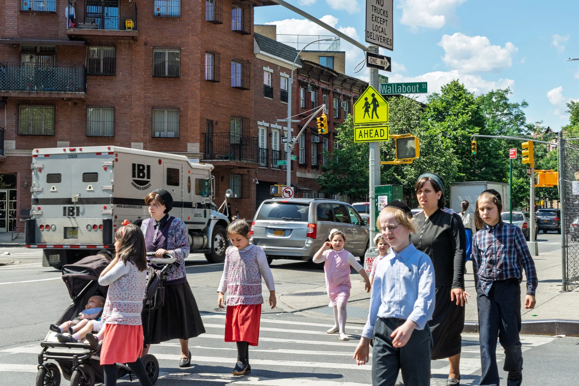 Hasidic family crossing Wallabout Street with IBI security van, South Williamsburg Brooklyn — Sony a7II
