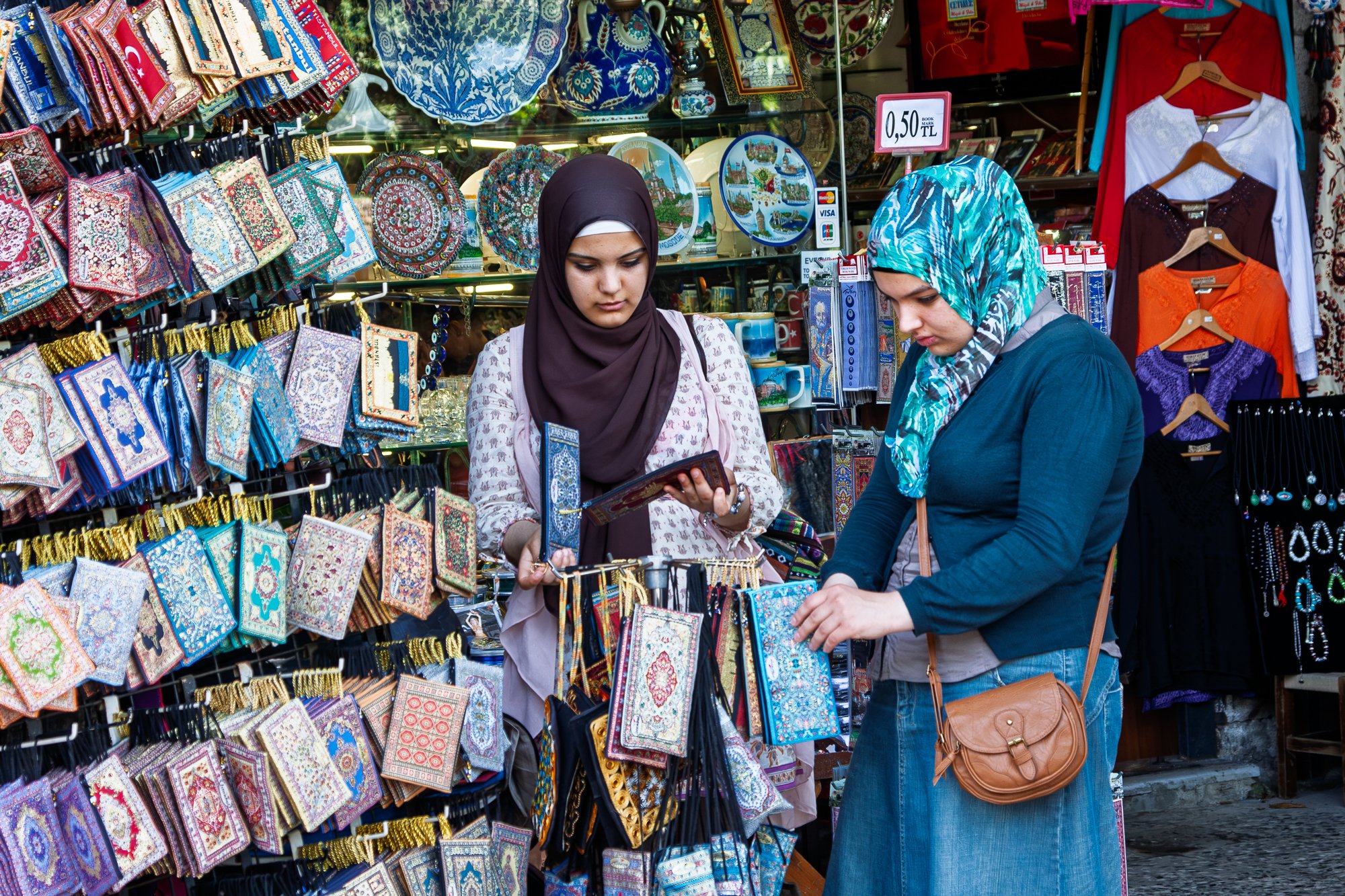 Two women examining embroidered purses at a souvenir stall, Grand Bazaar, Istanbul — Canon EOS 40D