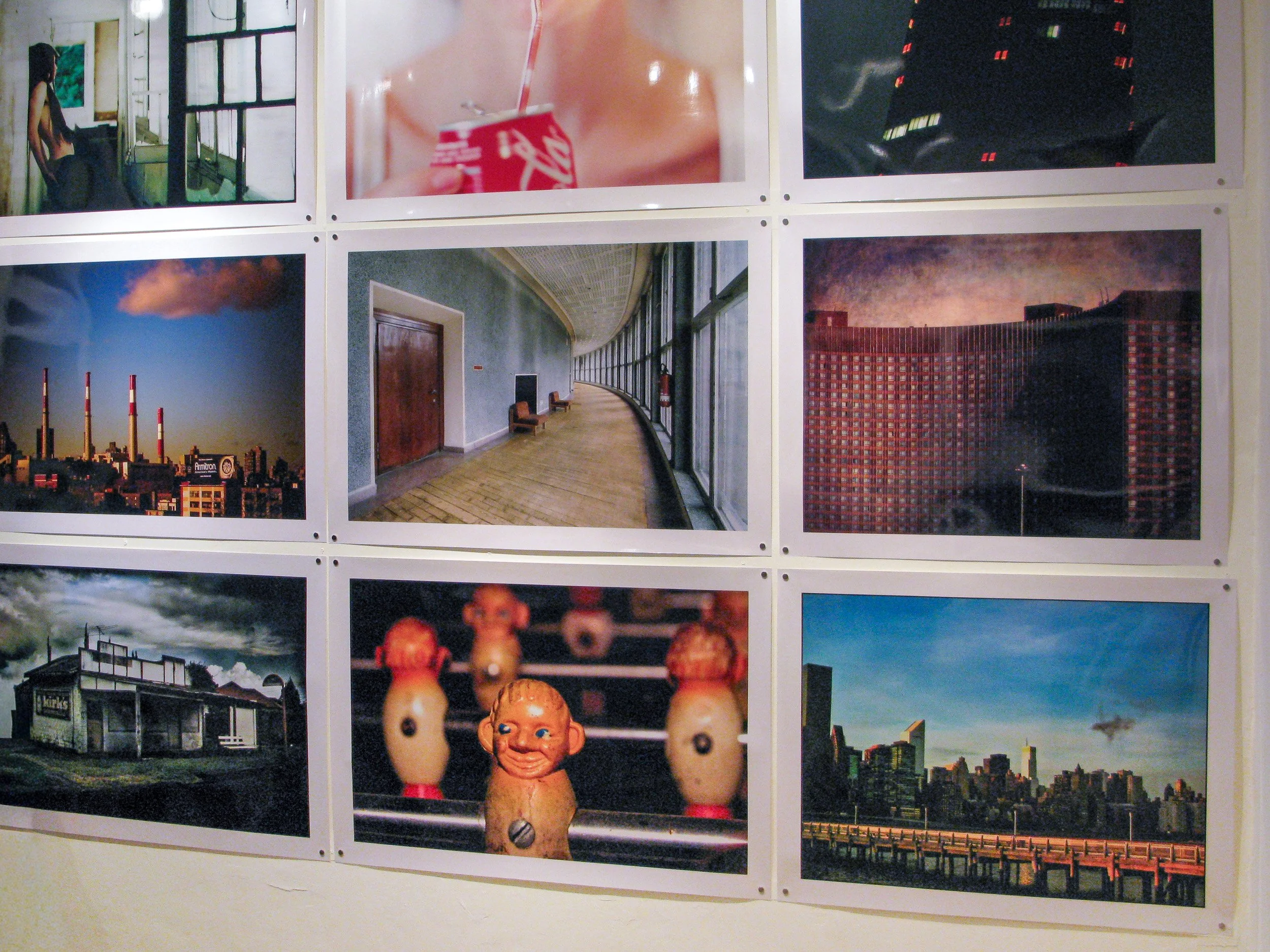 Wall of prints at the 100x100 PHOTO group exhibition, espai [b], Barcelona, 2010, with Cosme Lapena's Futbolí in the bottom centre.